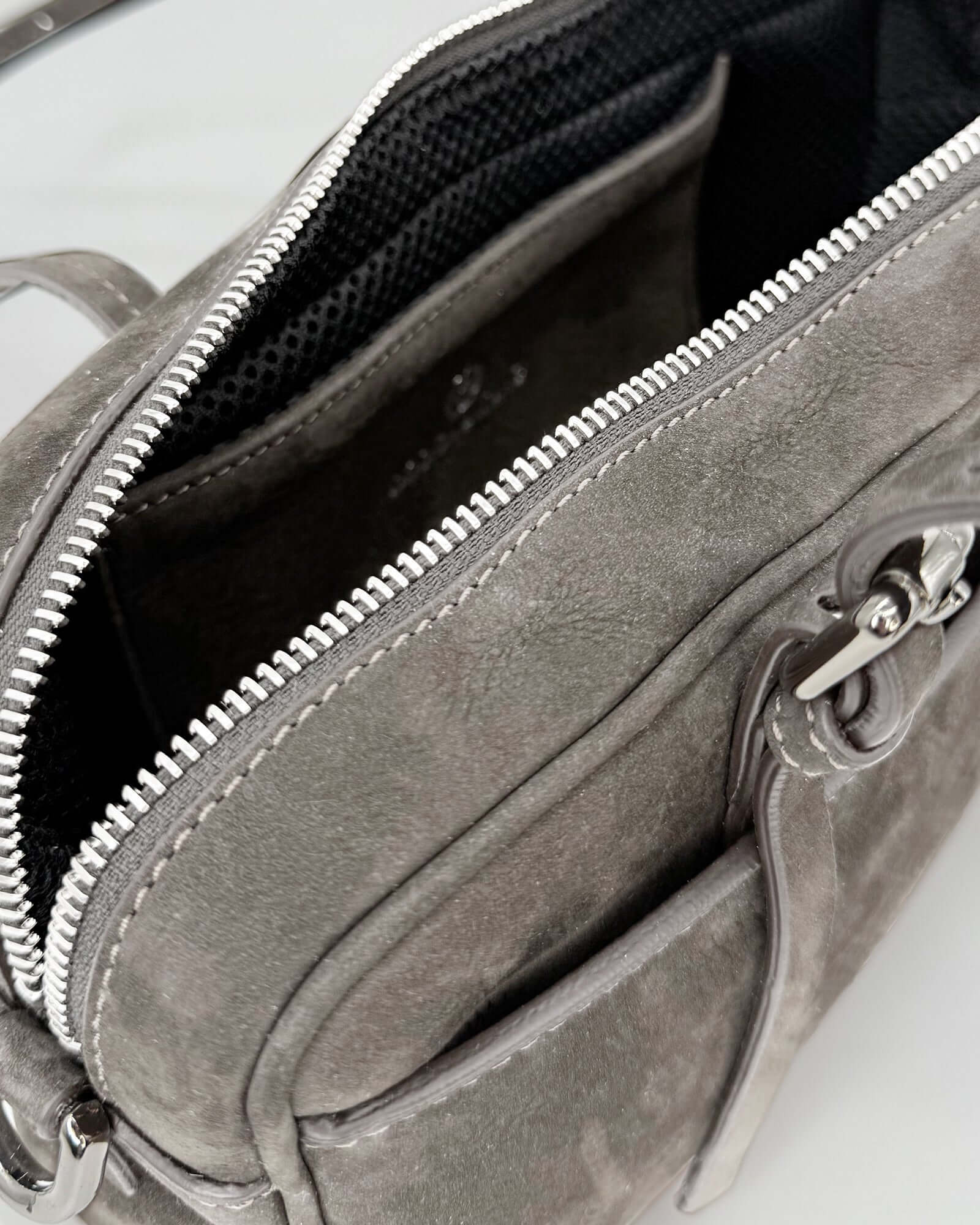 ASIA NABUK interior view showing the soft nabuk leather and zip closure.