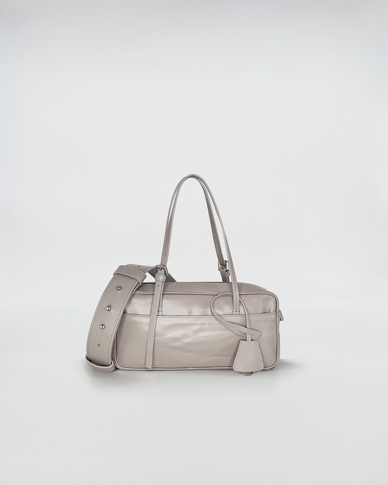 ASIA VITELLO LAVATO bag in light grey leather with adjustable strap and elegant design.