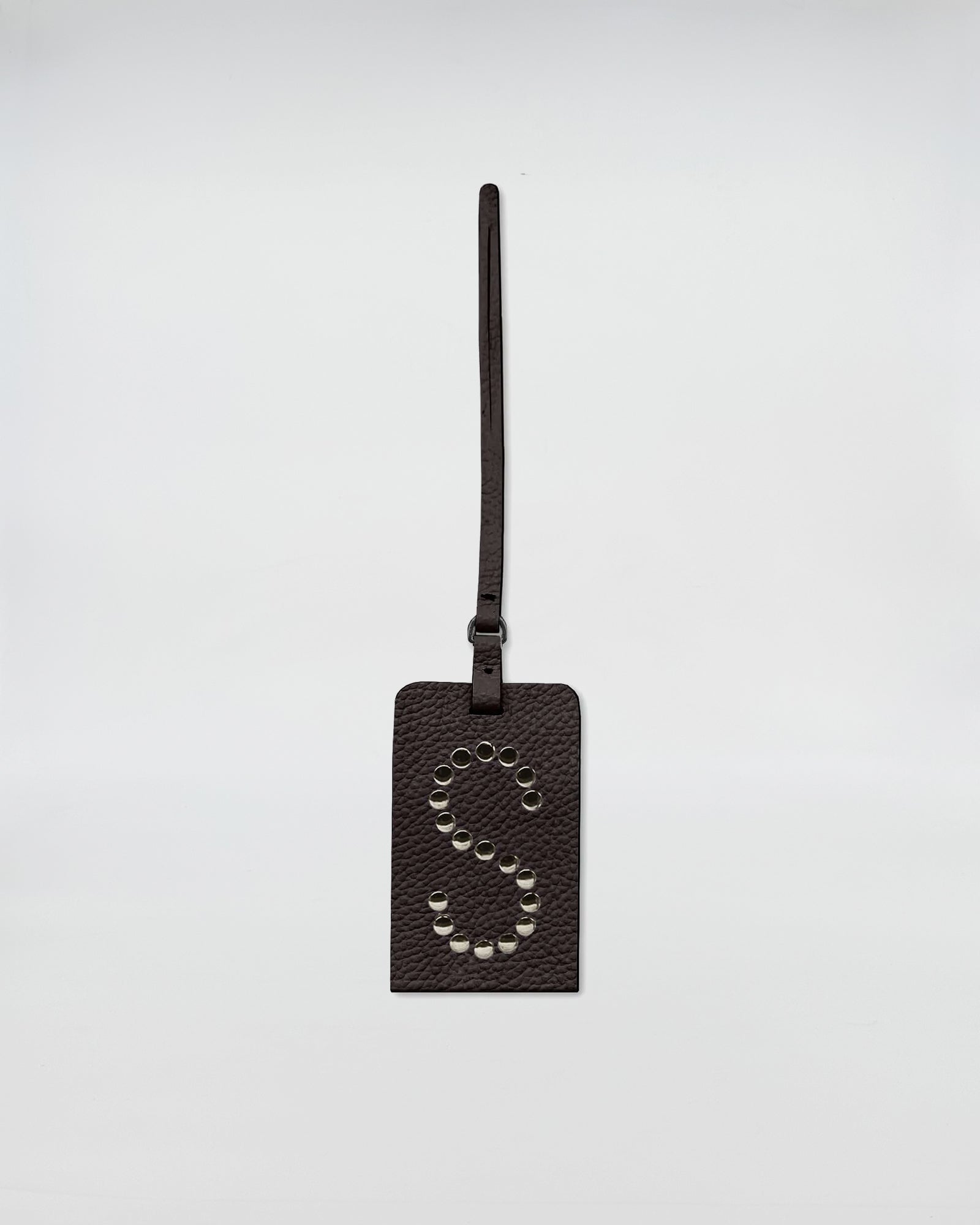 CHARM PERSONALIZZATO ROCK in pelle rettangolare, personalizzabile, con lettera S e occhielli nickel.