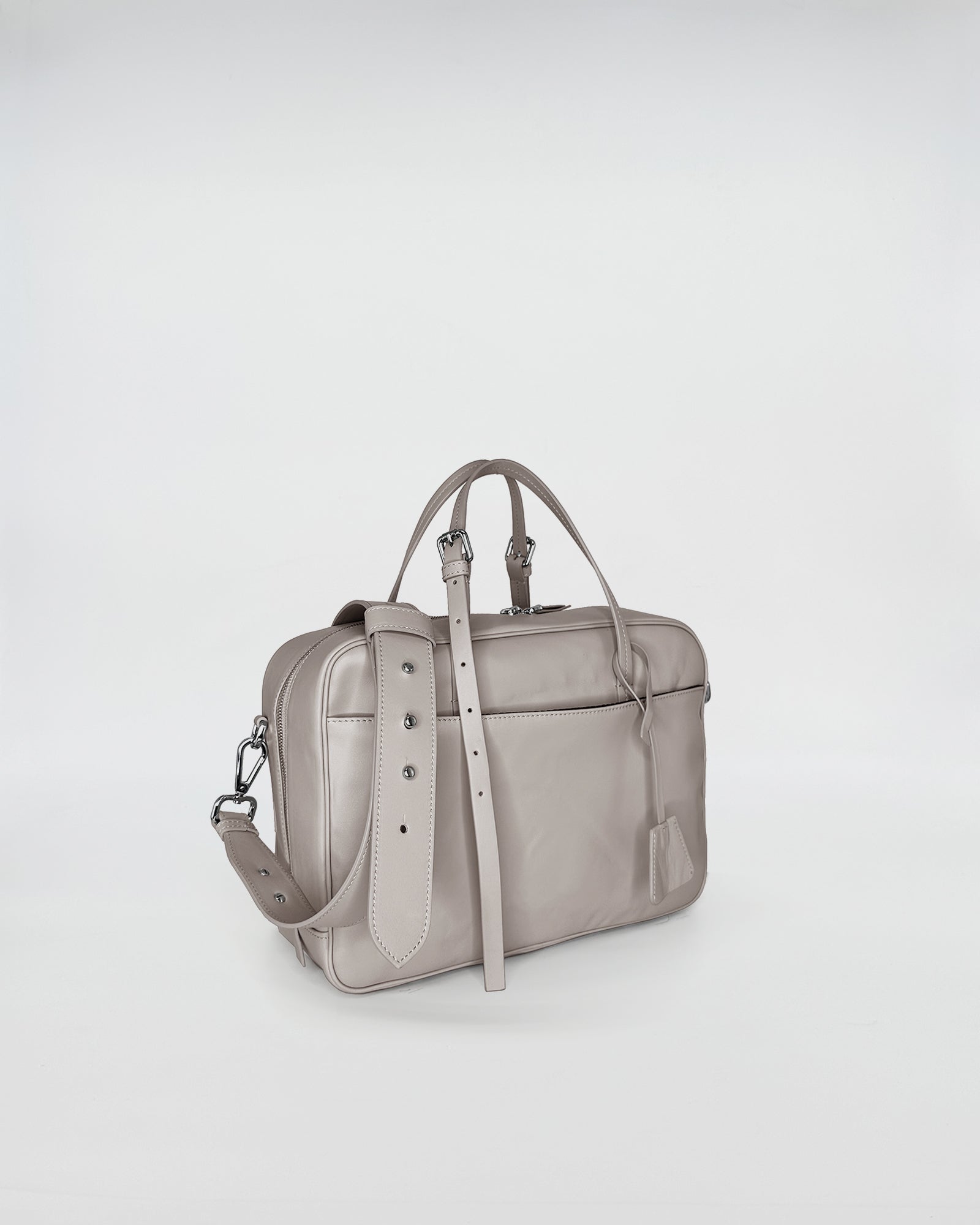 FRIDA MEDIUM VITELLO LAVATO grey leather handbag with adjustable strap and retro design.