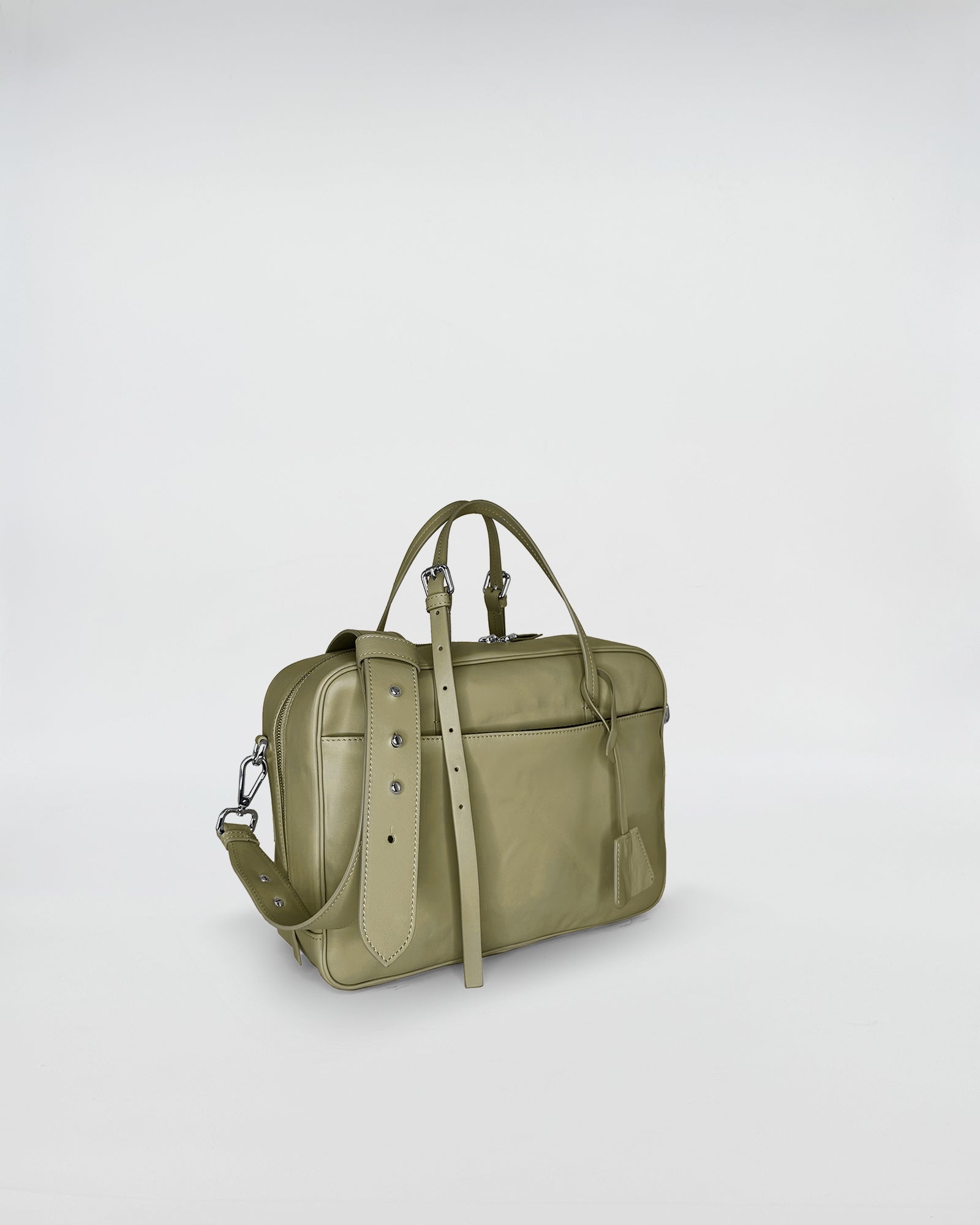 FRIDA SMALL VITELLO LAVATO in olive green, featuring a sleek design with adjustable strap and retro-inspired elegance.