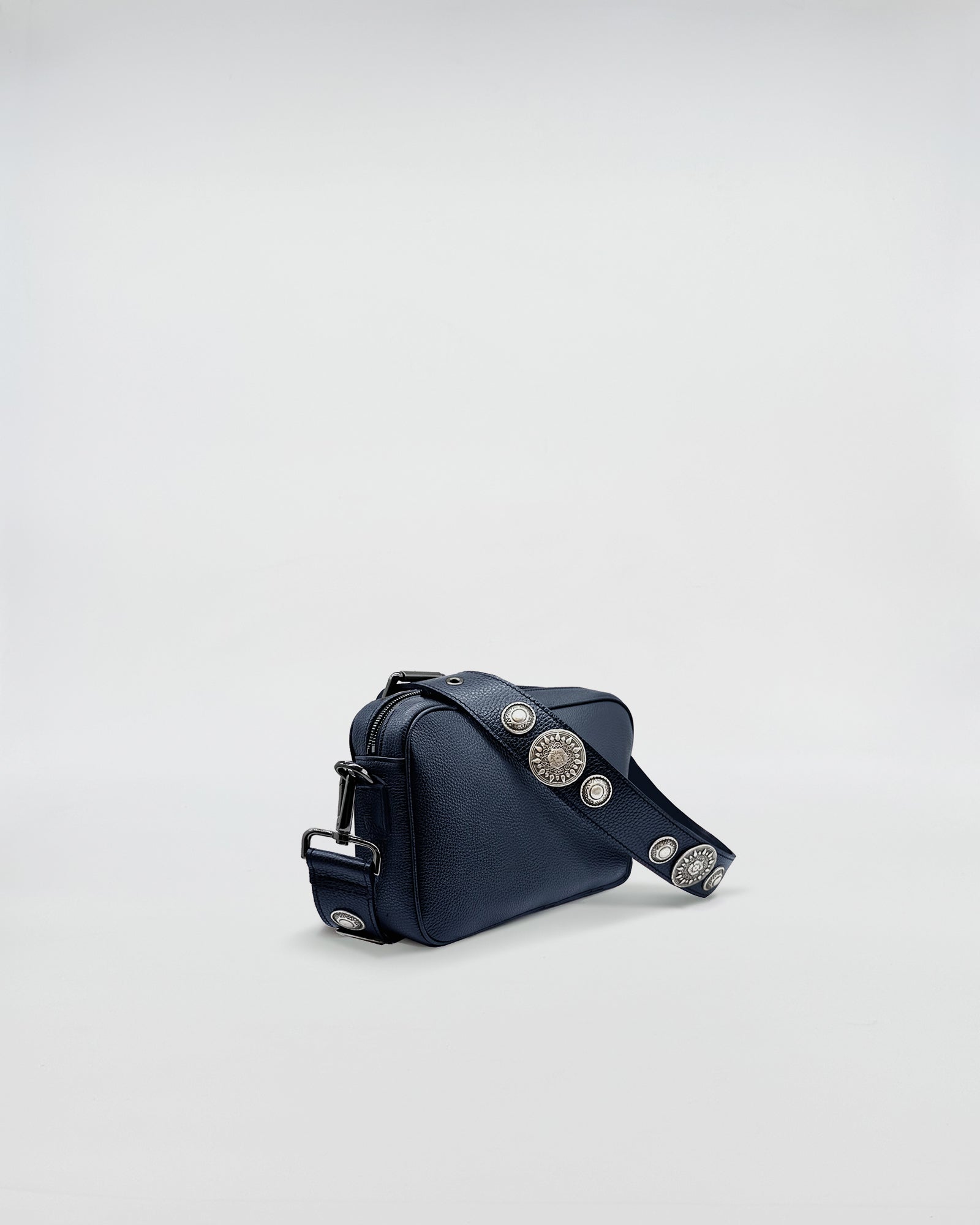 MAFALDA ROCK stylish navy bag with decorative silver studs and adjustable strap for versatile use.