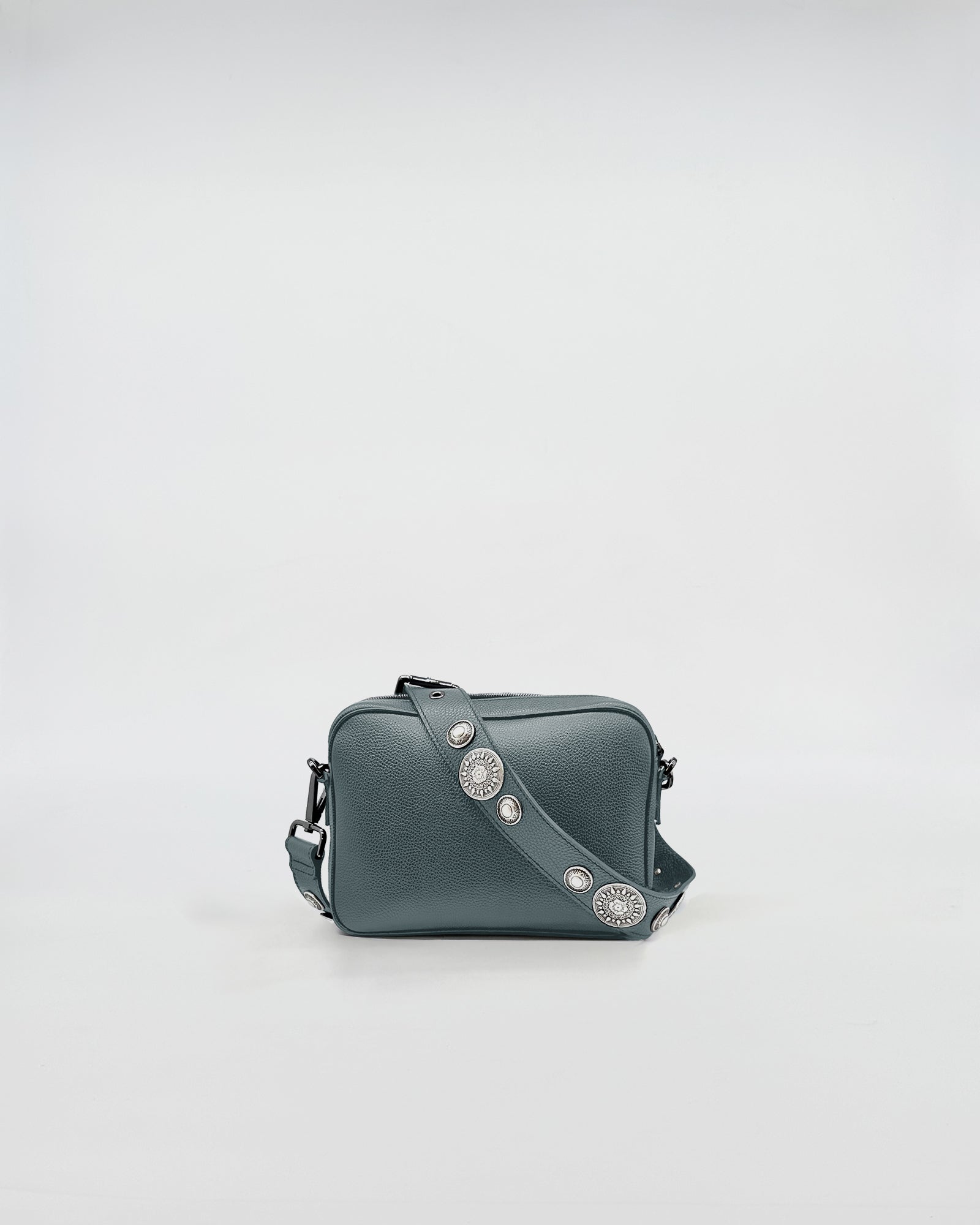MAFALDA ROCK crossbody bag in green leather with decorative studs and adjustable strap.