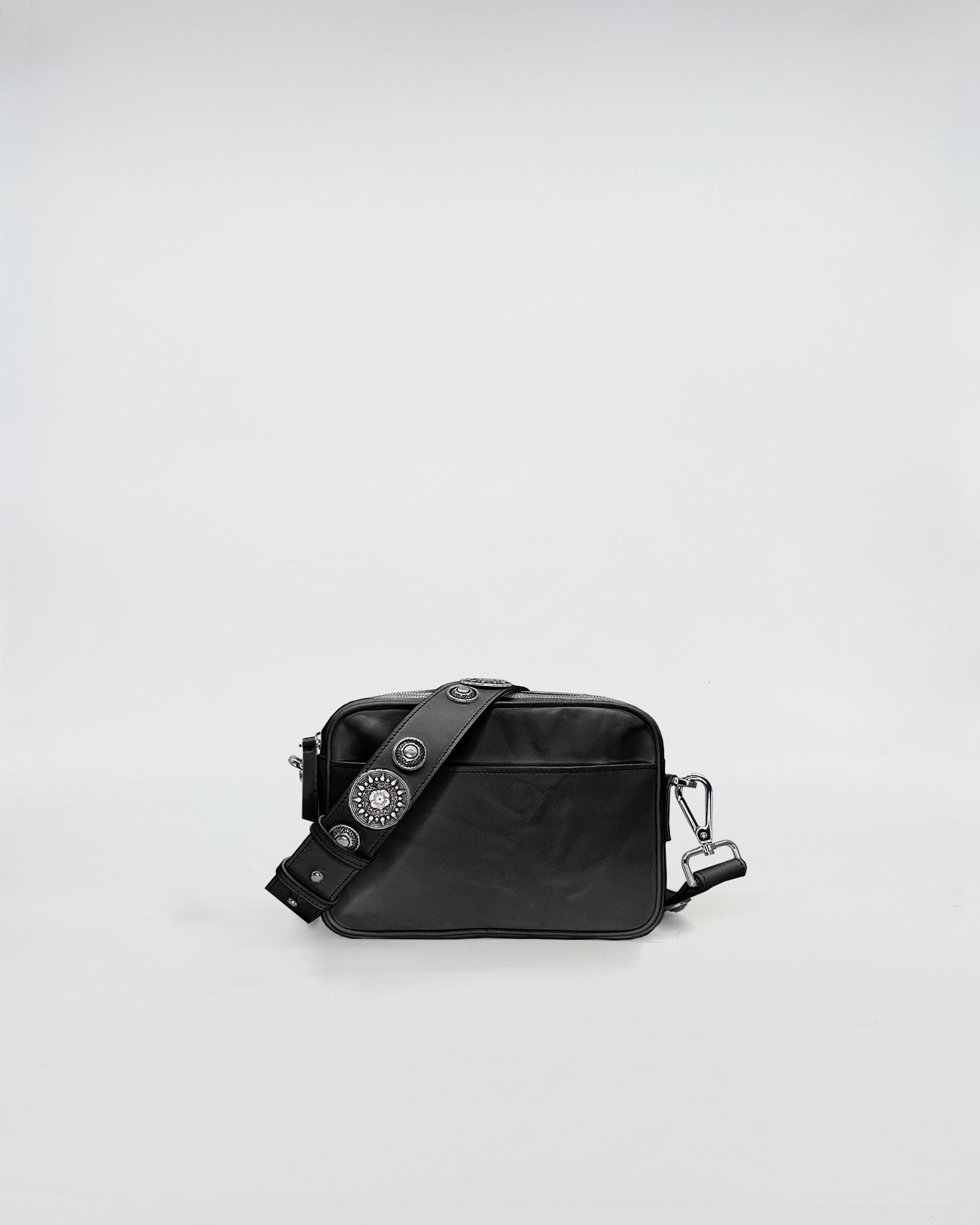 MAFALDA VITELLO LAVATO ROCK black bag with removable studded shoulder strap on a plain background.