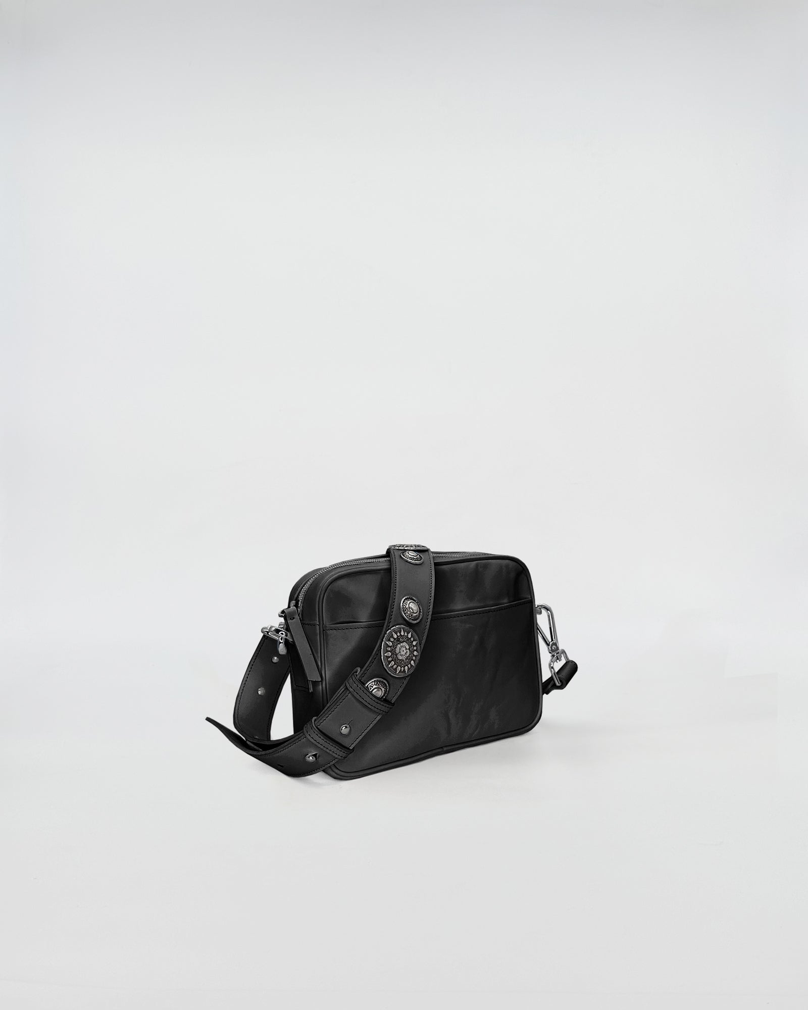 MAFALDA VITELLO LAVATO ROCK stylish black bag with removable strap and rock-style embellishments.