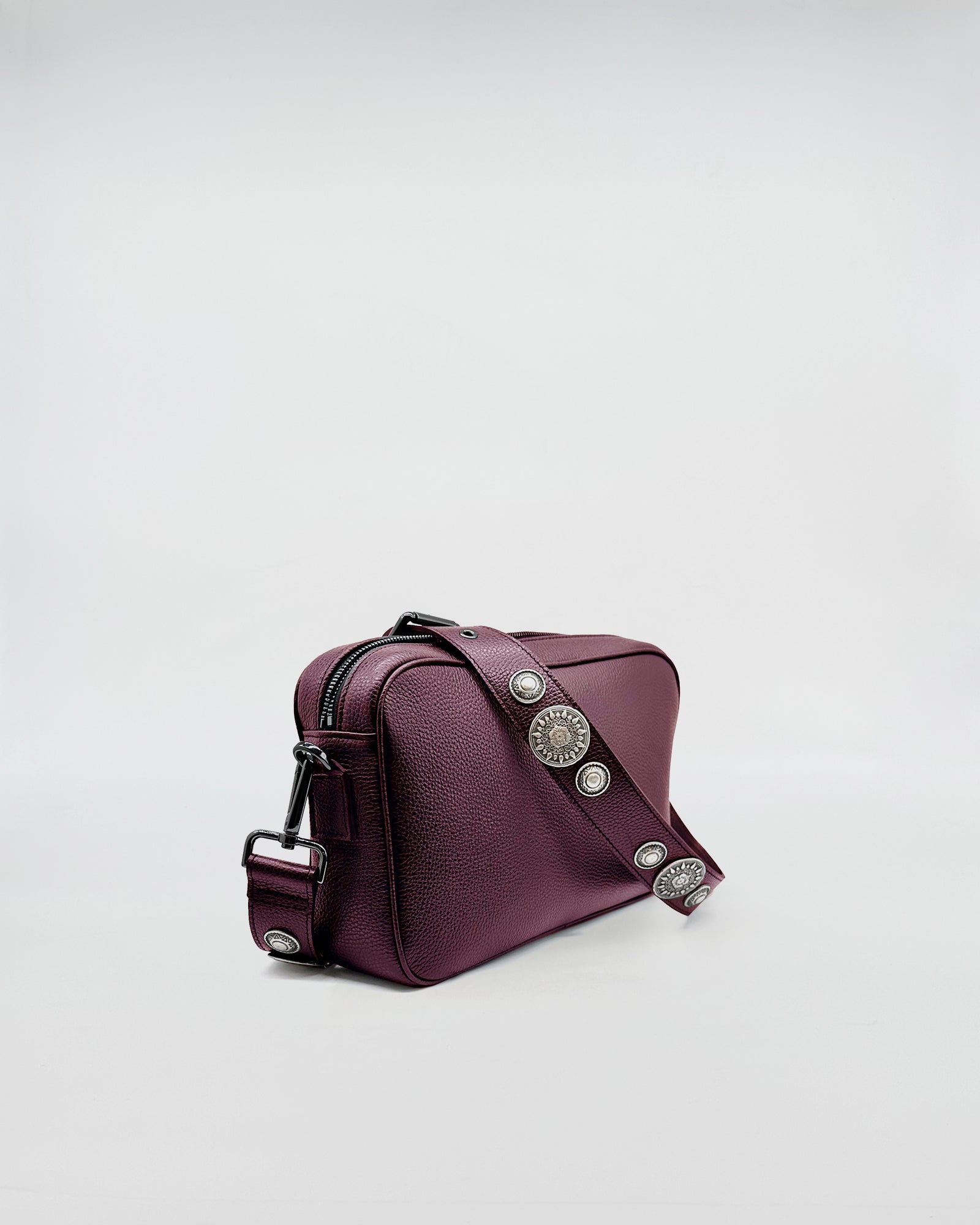 MAFALDONA ROCK in rich purple leather, featuring a stylish adjustable strap and functional design.
