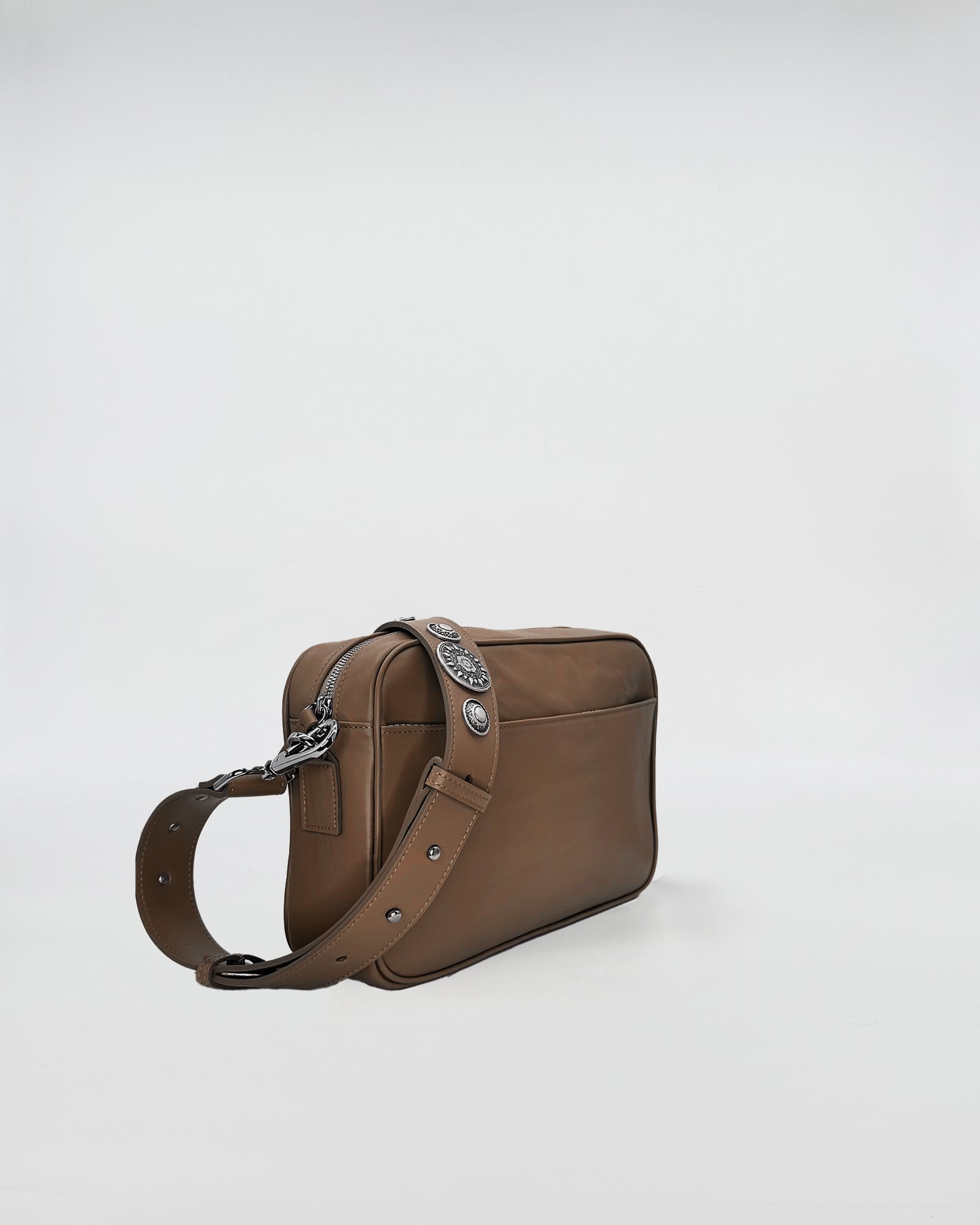 MAFALDONA VITELLO LAVATO ROCK bag with removable studded shoulder strap, showcasing sleek design and functionality.