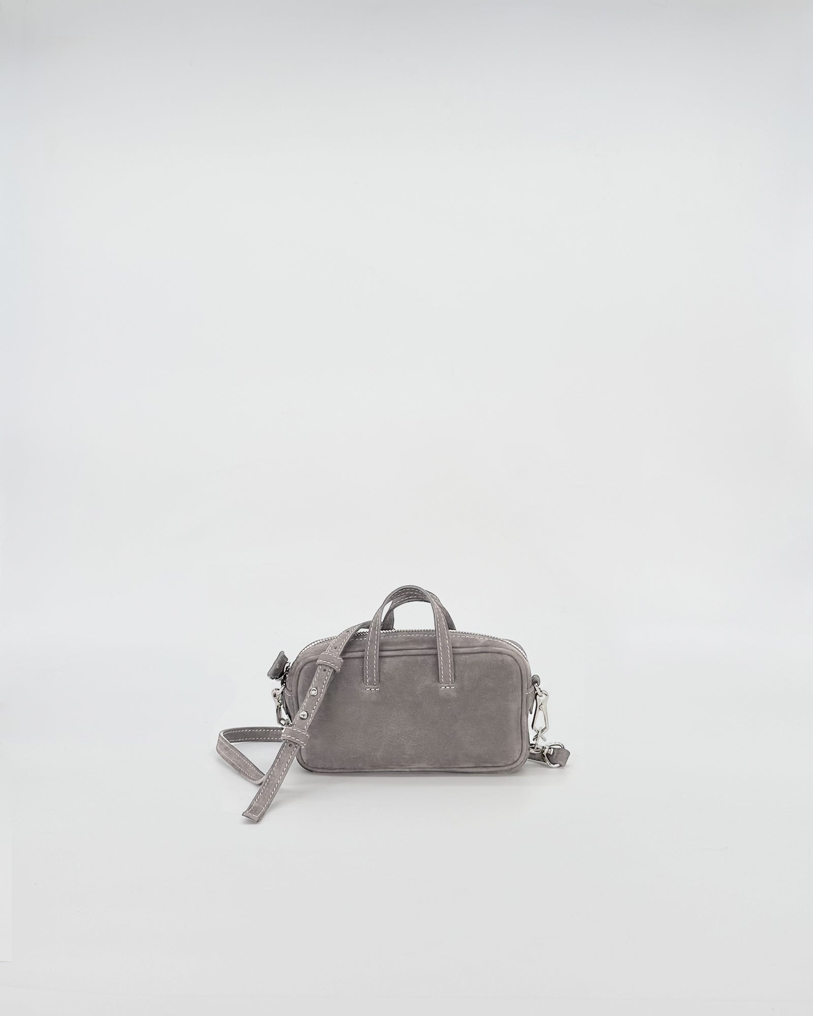 Compact and stylish Nina nabuk bag in gray with elegant chain handle, showcasing sophisticated design.