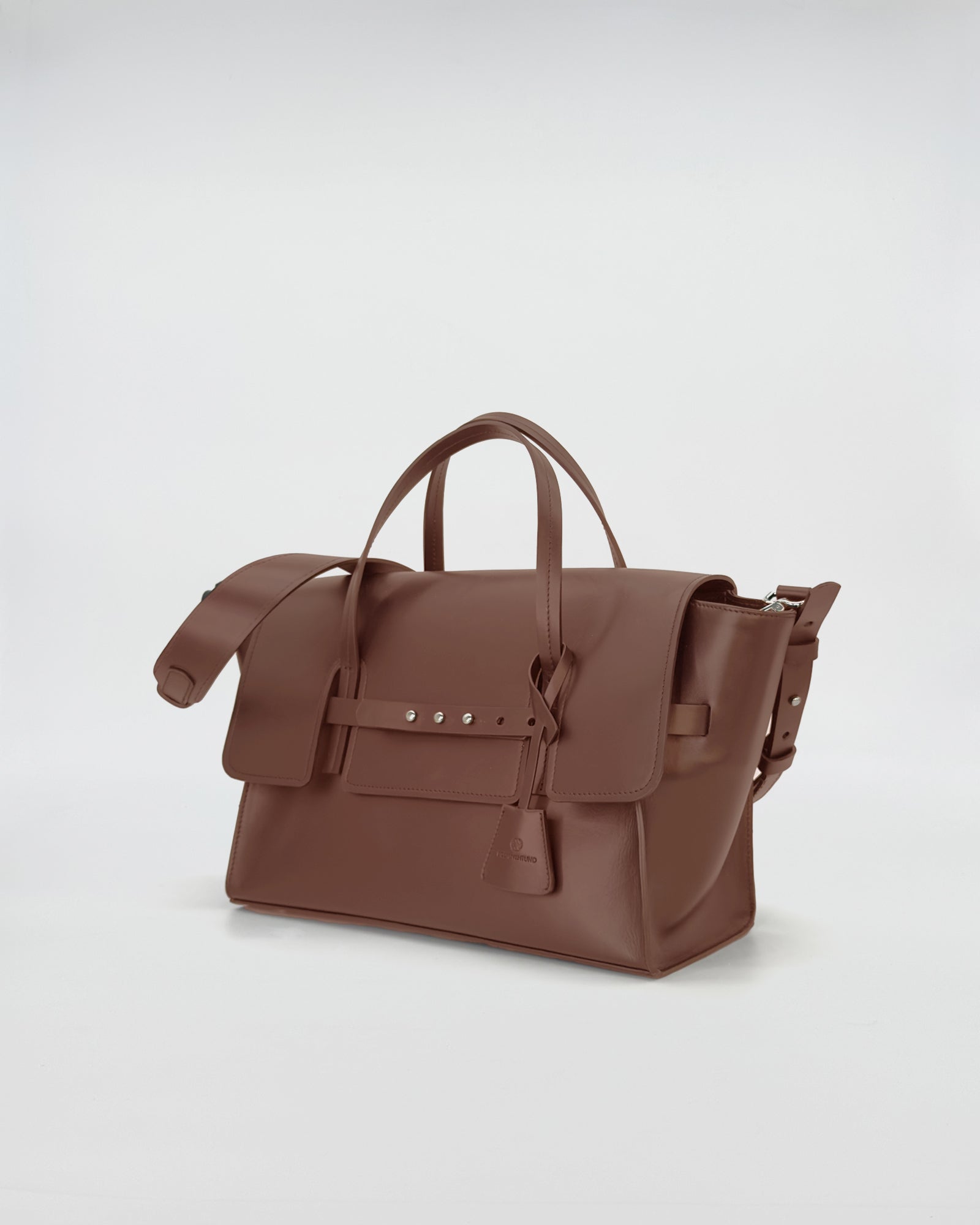 Elegant medium vitello bag in rich brown with refined strap and polished design.