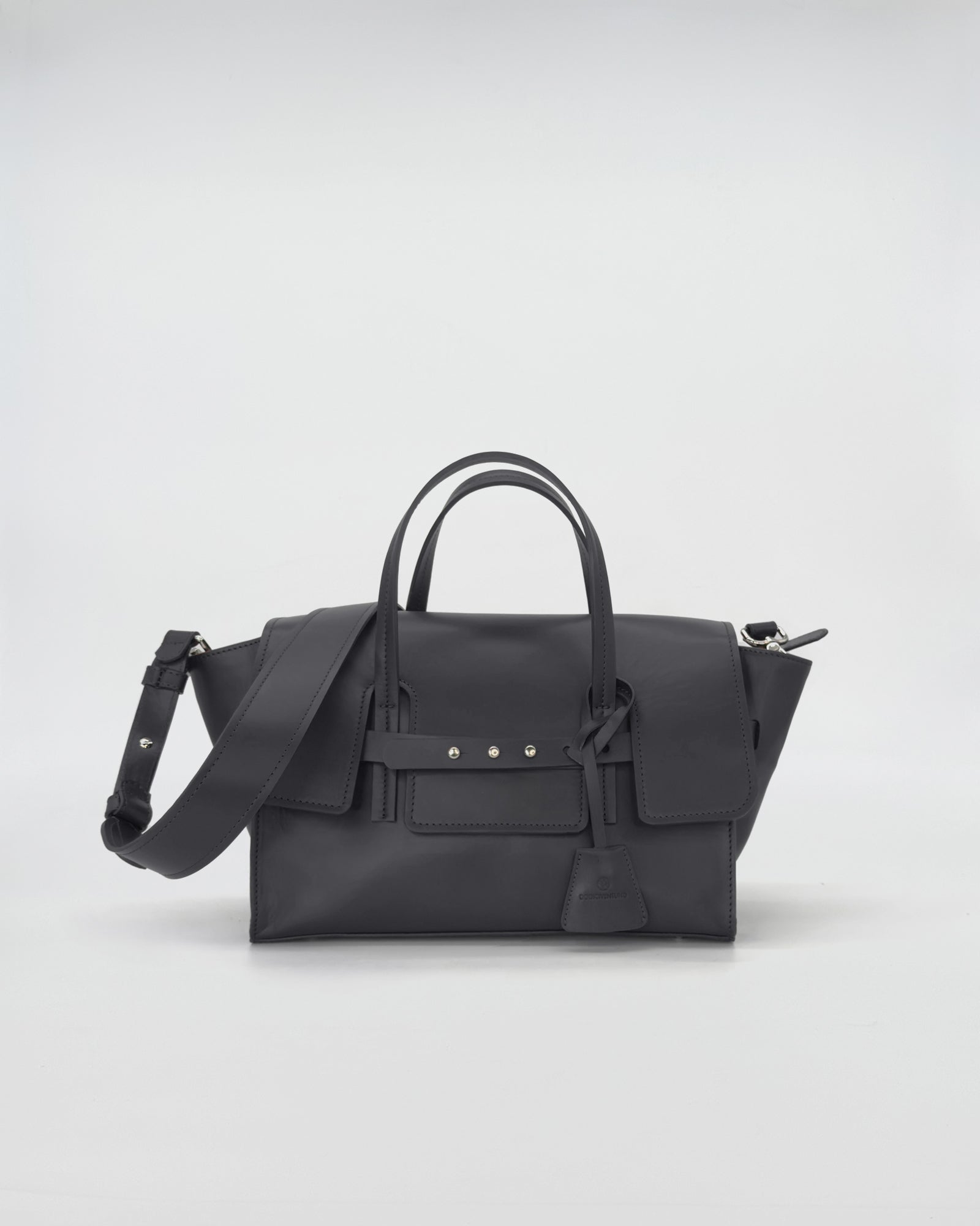 Stylish small vitello bag in black with elegant design and adjustable strap.