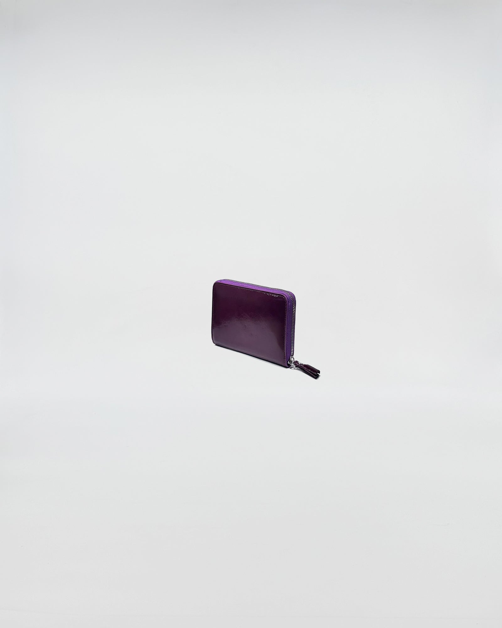 PORTAFOGLIO ZIP MINI in violet leather, stylish and elegant accessory for everyday use and special occasions.