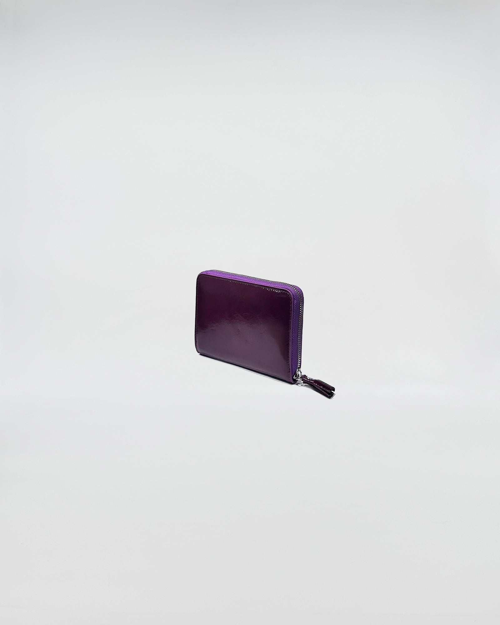 PORTAFOGLIO ZIP SMALL in purple vitello leather, featuring a stylish zip closure and sleek design for everyday use.