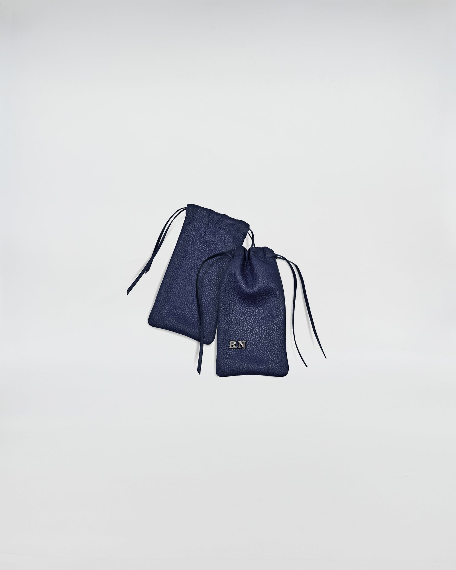 PORTA OCCHIALI LEO navy blue drawstring bags with RN logo for stylish eyewear storage.