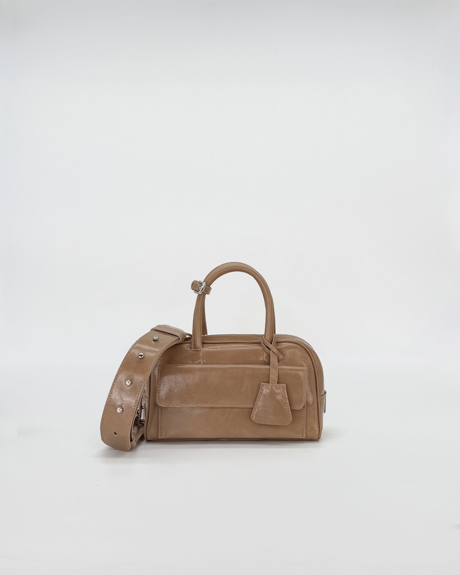 Zoe Mini Vitello Semilucido handbag in light brown, featuring a detachable strap and sleek design, perfect for casual or elegant occasions.