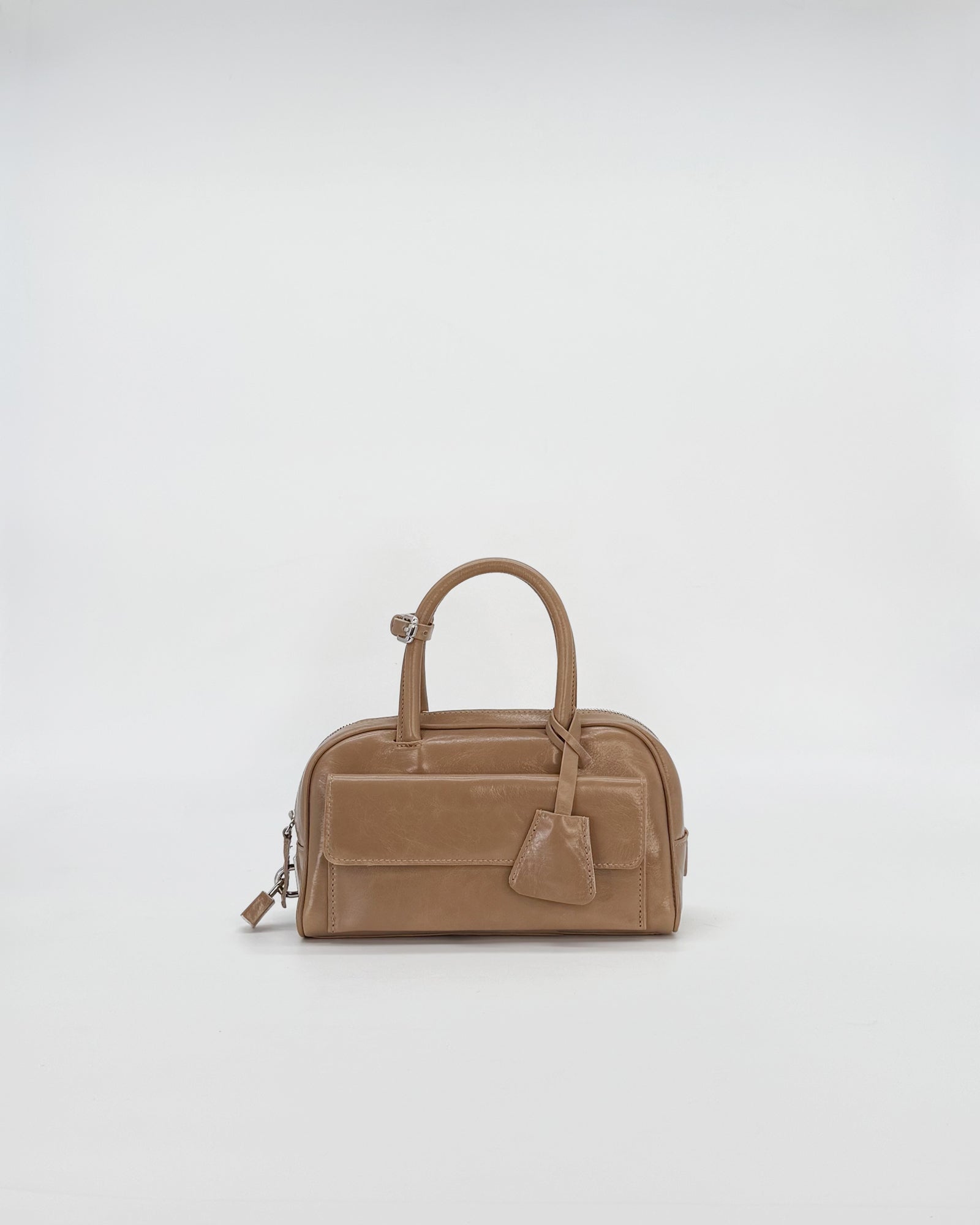 Zoe Mini Vitello Semilucido handbag in light brown, featuring a stylish design and compact size.