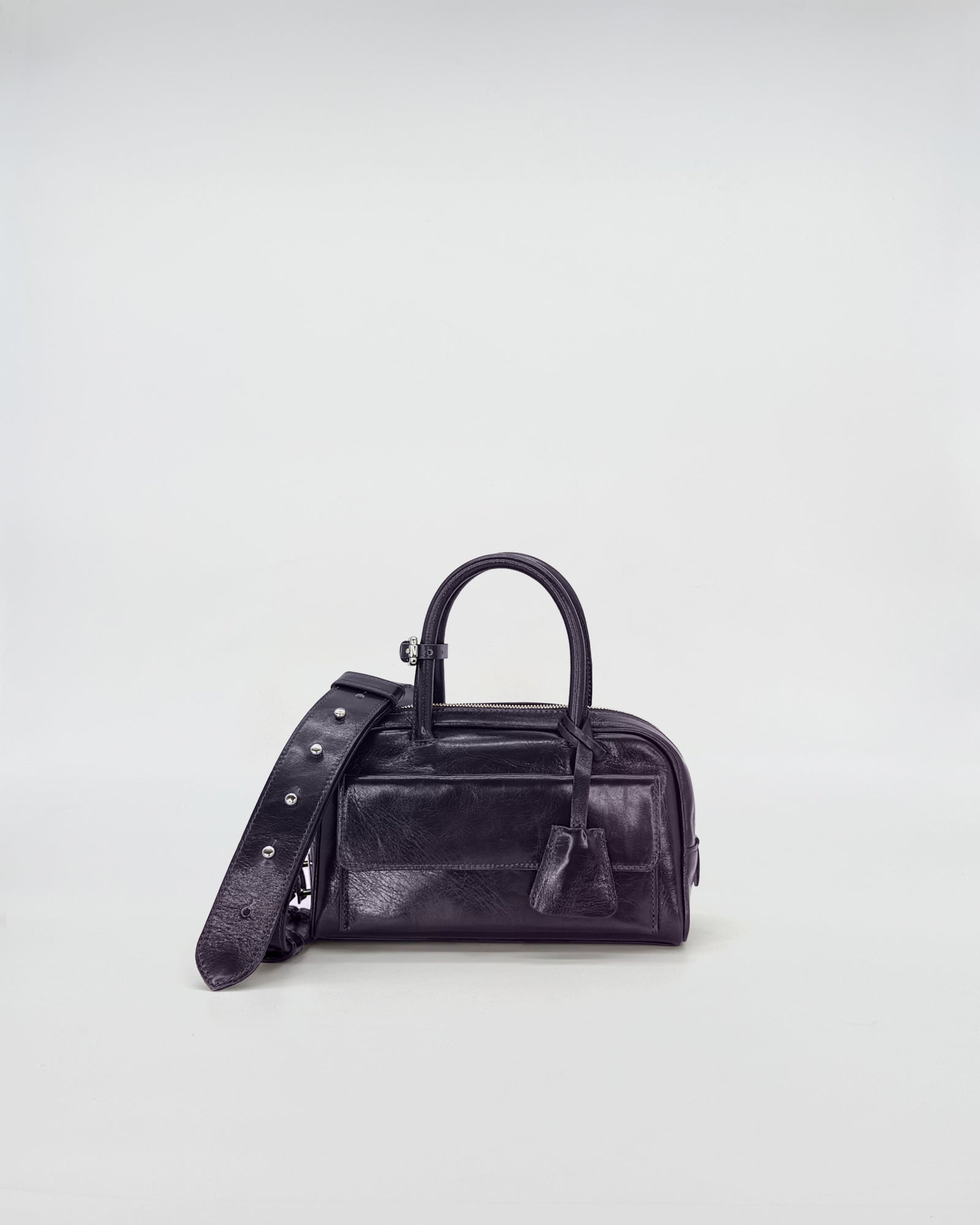 Zoe Mini Vitello Semilucido black handbag with detachable strap, elegant compact design for casual or sophisticated occasions.