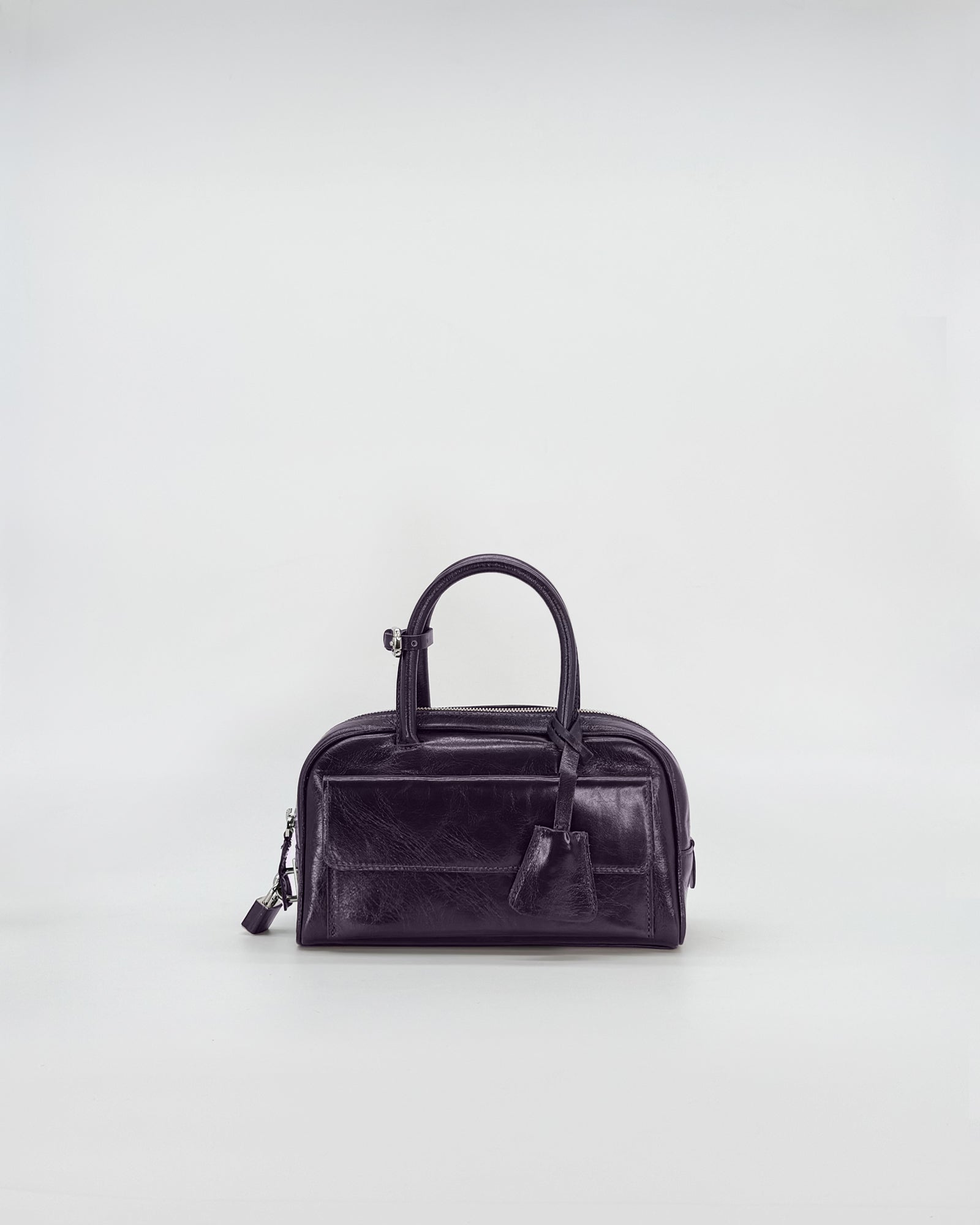 ZOE Mini Vitello Semilucido black handbag, compact and elegant design, perfect for casual and sophisticated outings.