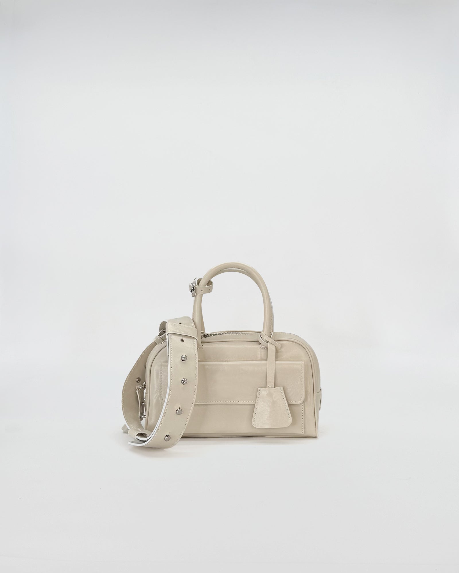 ZOE mini vitello semilucido handbag in beige with detachable shoulder strap, stylish and compact accessory for any occasion.