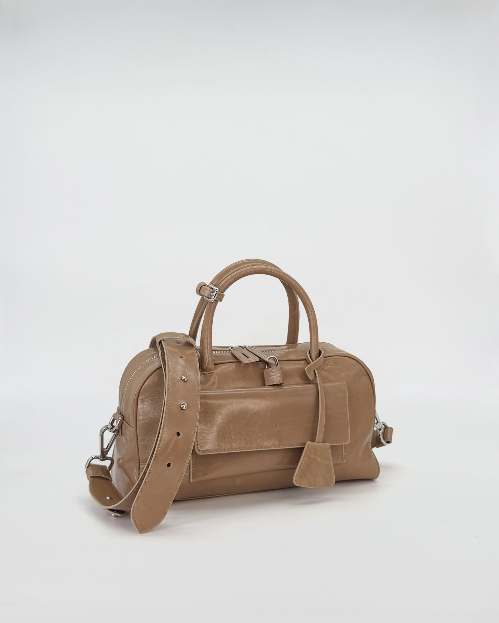 ZOE Small Vitello Semilucido bag in soft beige with clean lines and a retro-inspired silhouette.