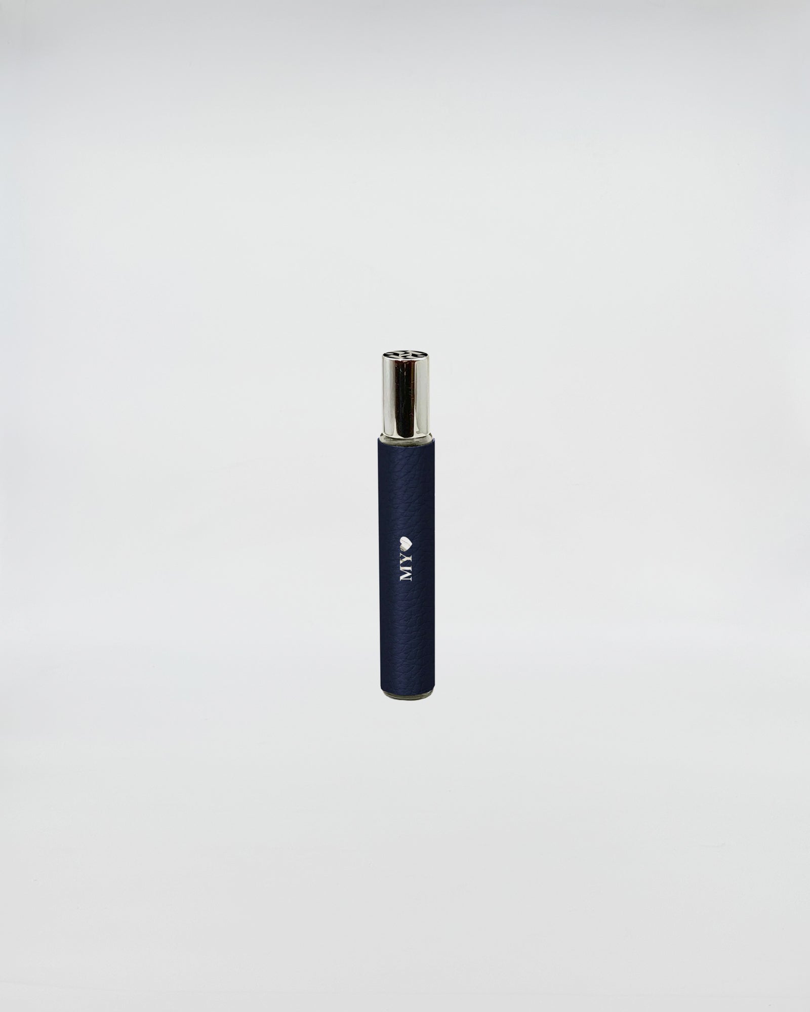 1221 FRAGRANCE BLU spray bottle with a sleek navy design for on-the-go fragrance application.