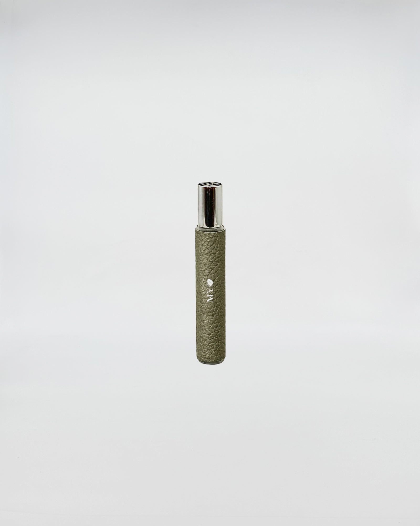 1221 FRAGRANCE MILITARY GREEN spray bottle in olive green color, designed for easy travel and personalization.