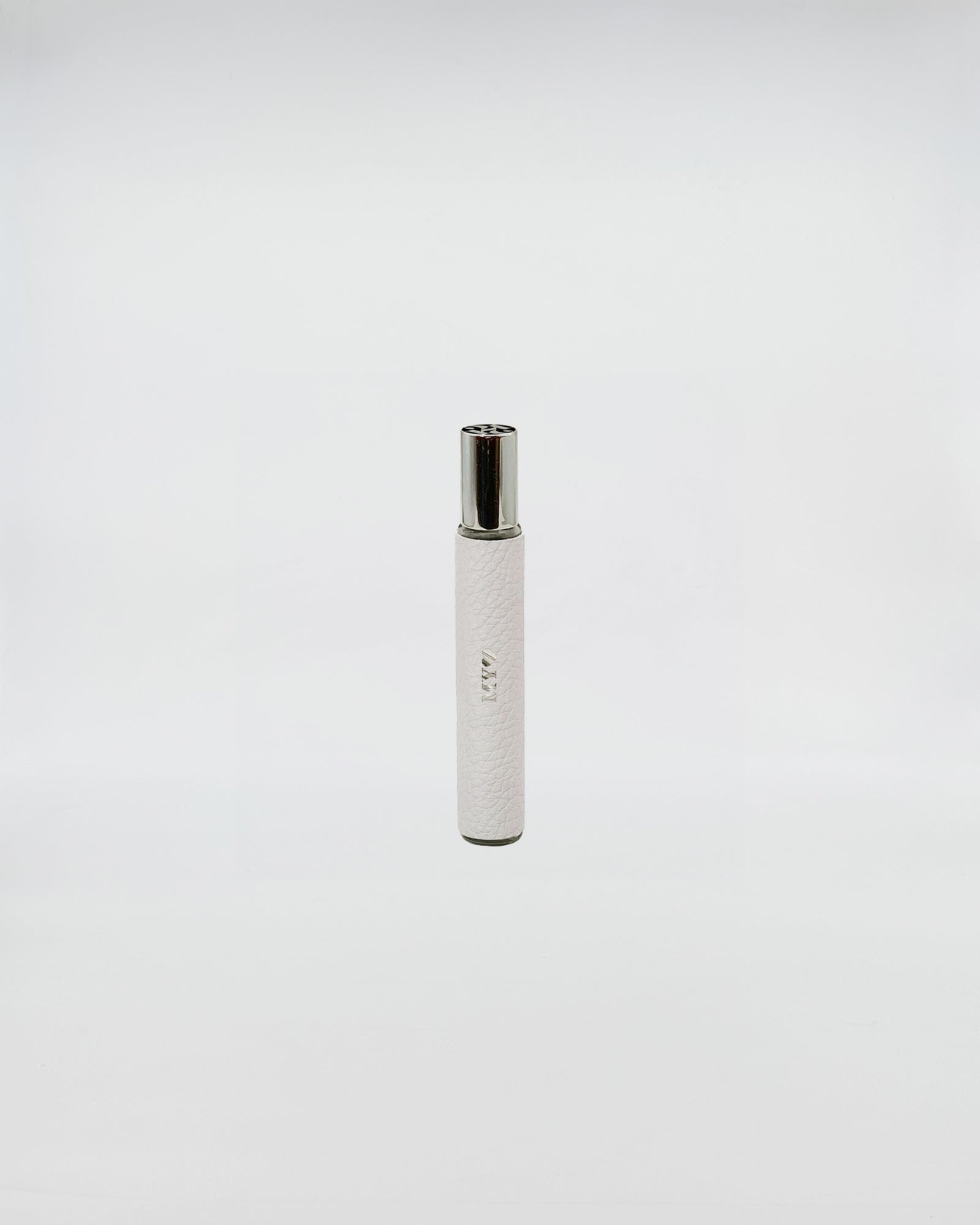 1221 FRAGRANCE OPTICAL WHITE spray bottle showcasing an elegant design, perfect for on-the-go fragrance application.