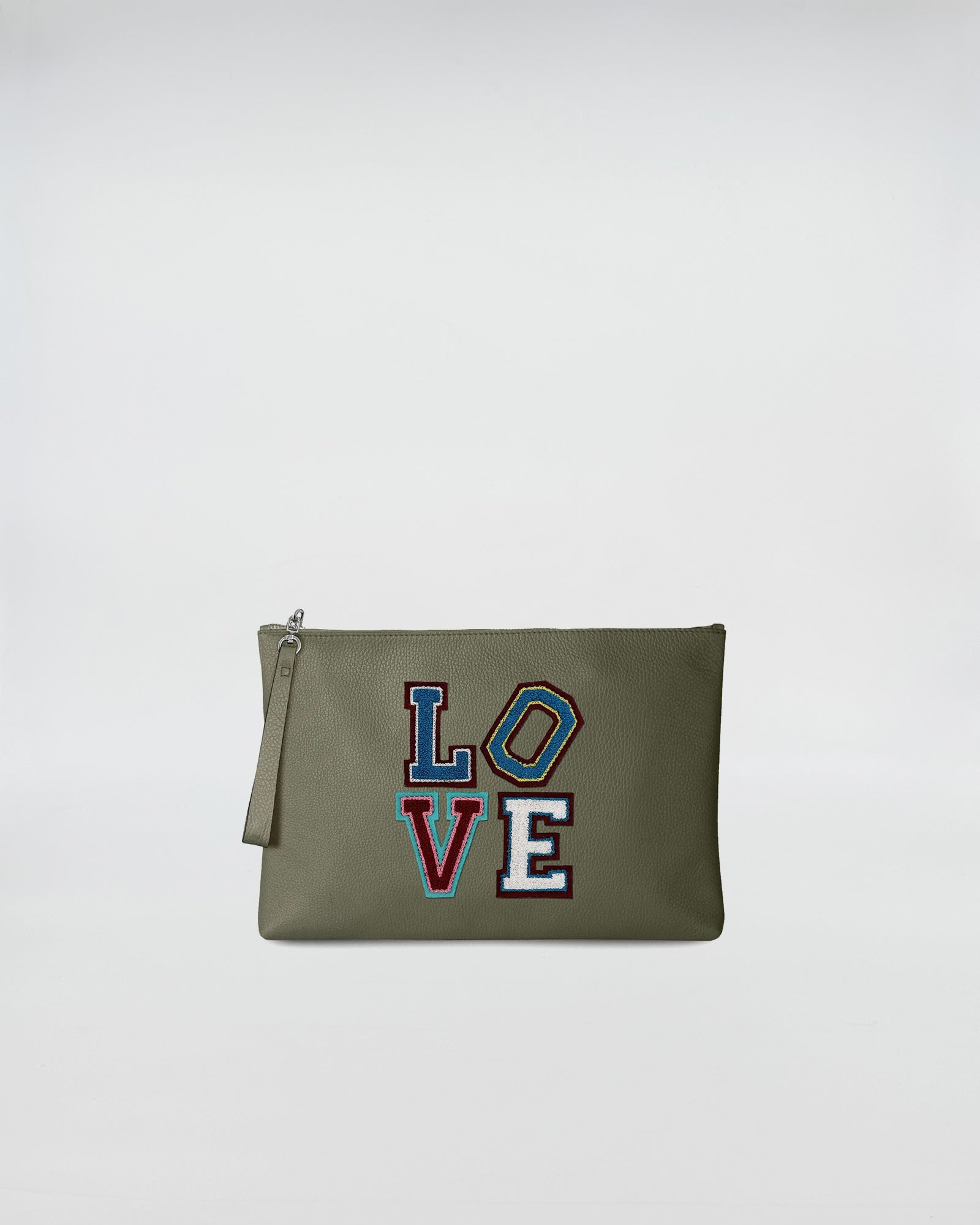 BUSTA A4 LOVE in green with colorful embroidered LOVE patch, featuring a zip closure and leather handle.