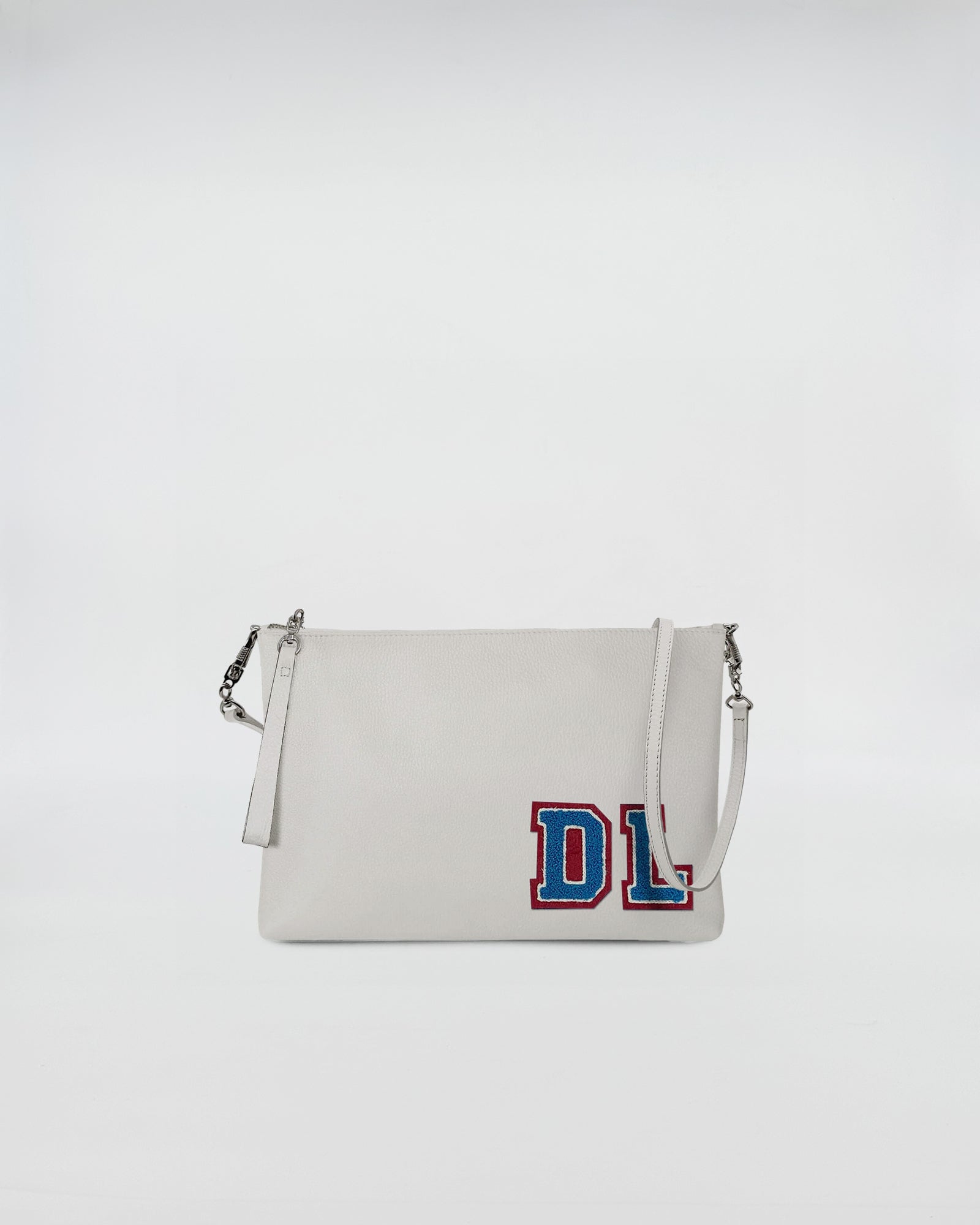 BUSTA A4 PERSONALIZZATA CON TRL in colore bianco con patch decorativa, tracolla regolabile e design pratico.