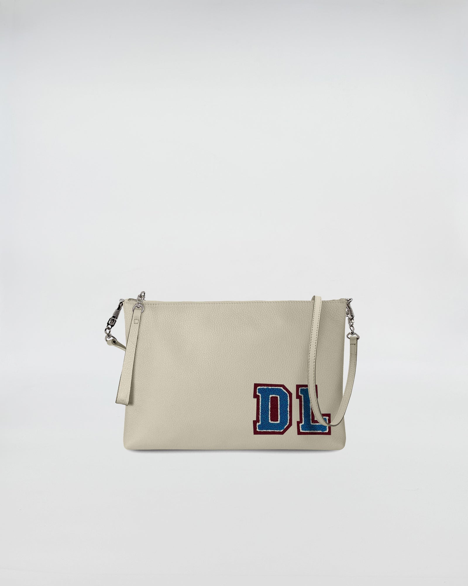 BUSTA A4 PERSONALIZZATA CON TRL con design elegante e tracolla rimovibile, decorata con patch spugna.
