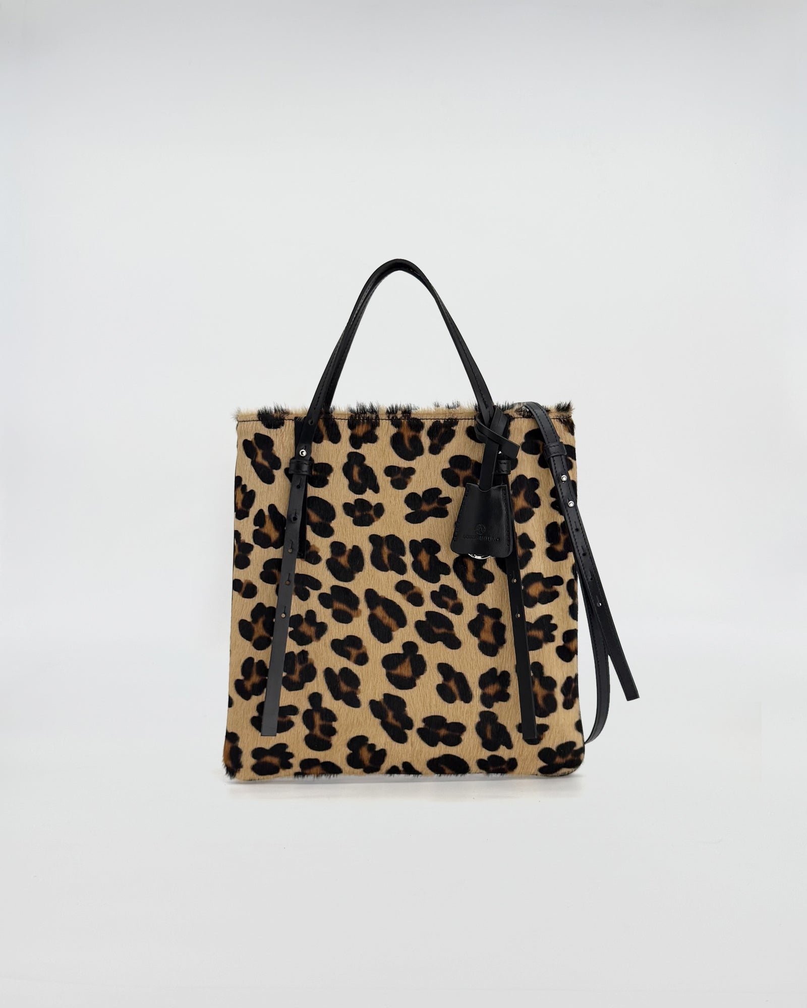 CELESTE VITELLO NON RASATO CON STAMPA ANIMALIER