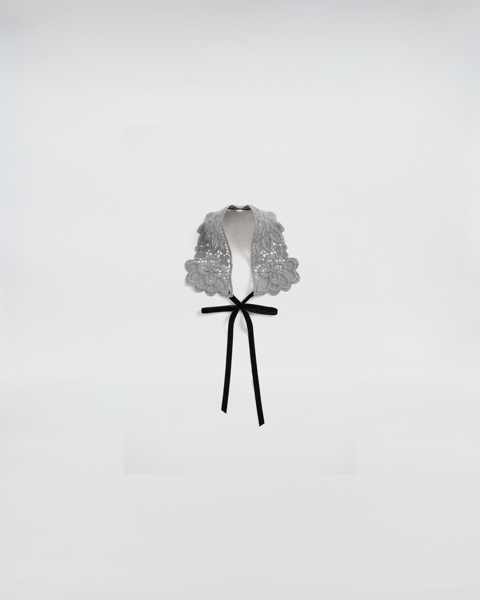 Elegant gray macramé lace collar with black ribbon, perfect for adding a romantic touch to any outfit.