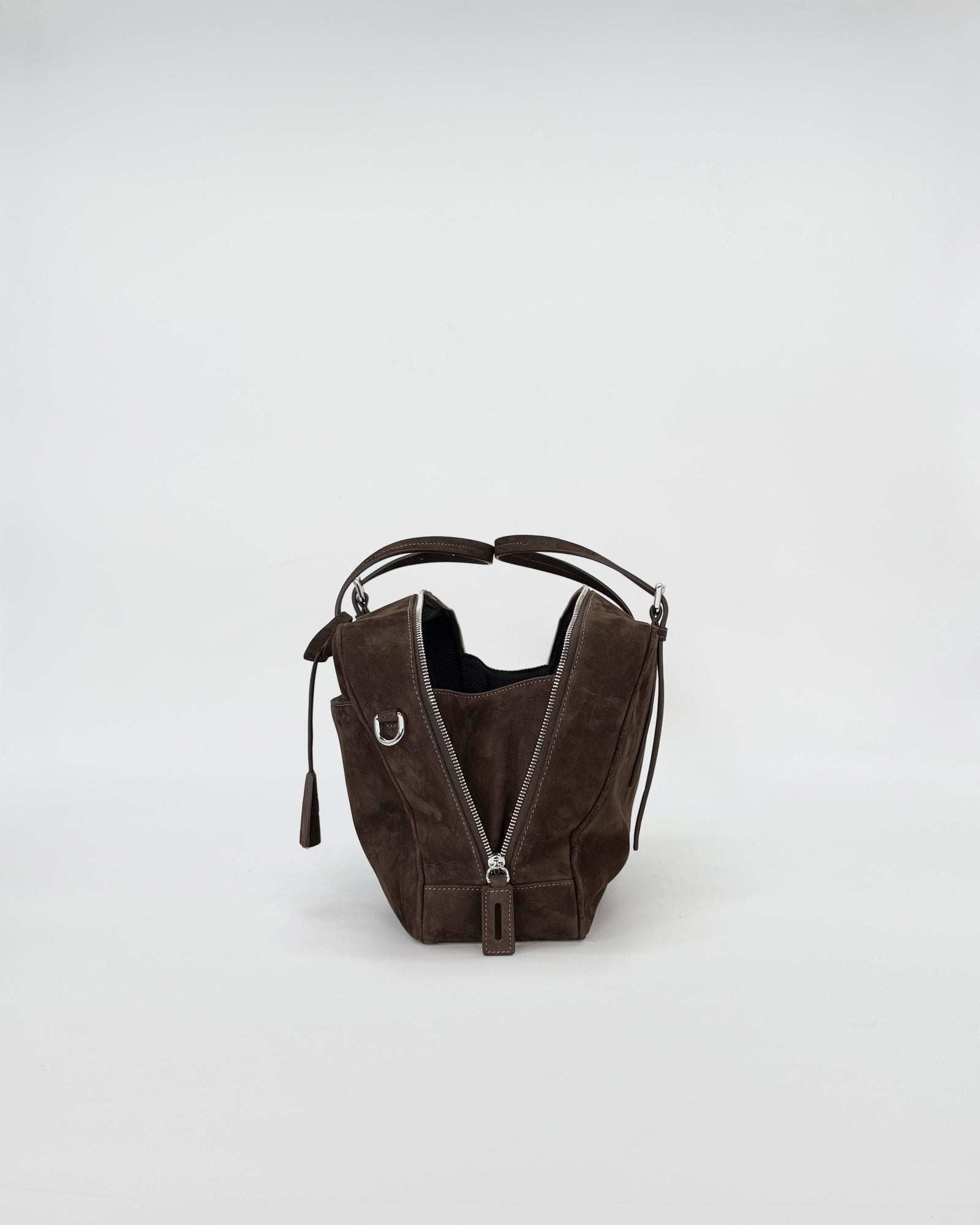 Frida medium nabuk bag in brown, showcasing its elegant retro design and modern sporty elements.