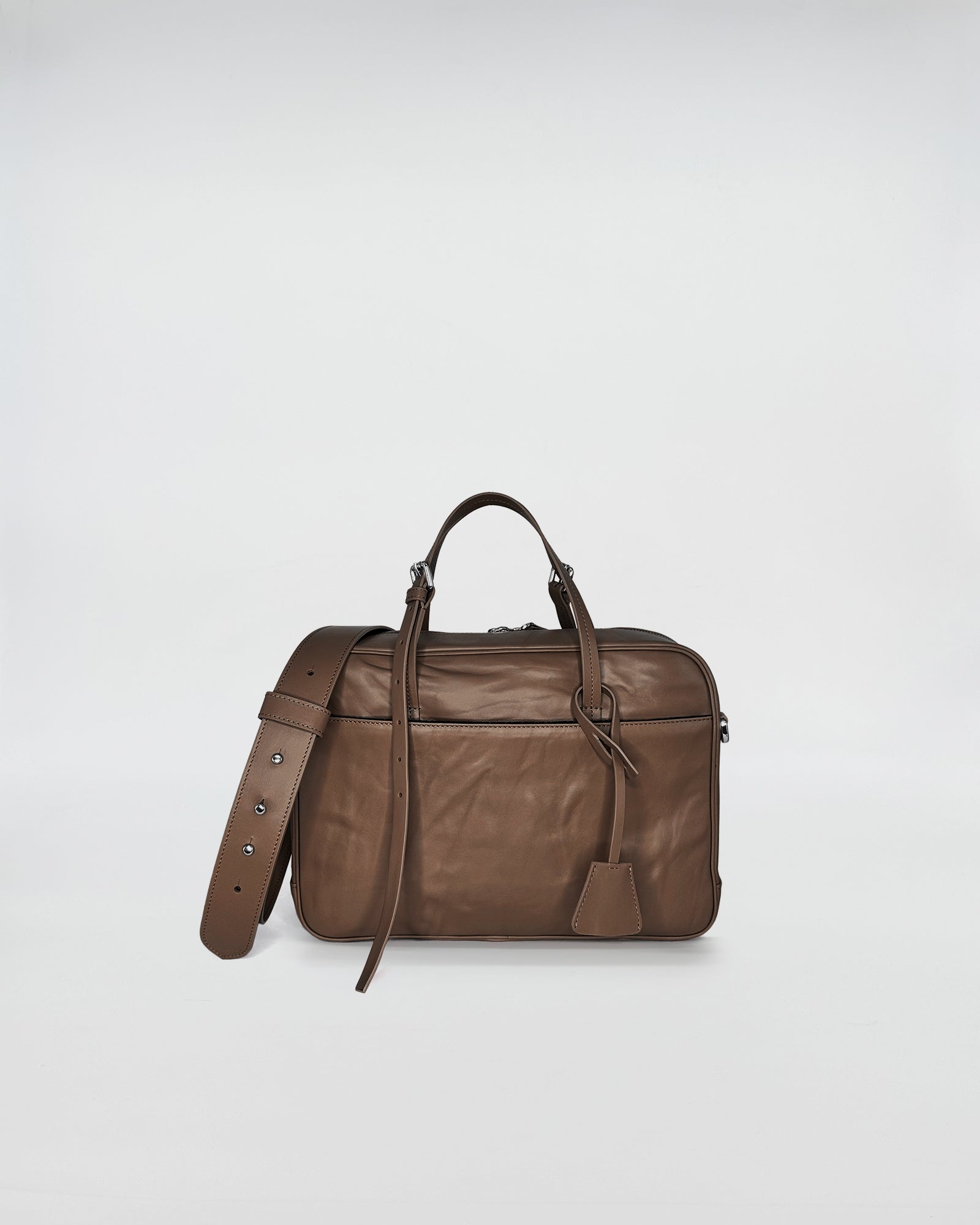 FRIDA SMALL VITELLO LAVATO brown leather handbag with adjustable strap and retro-modern design.