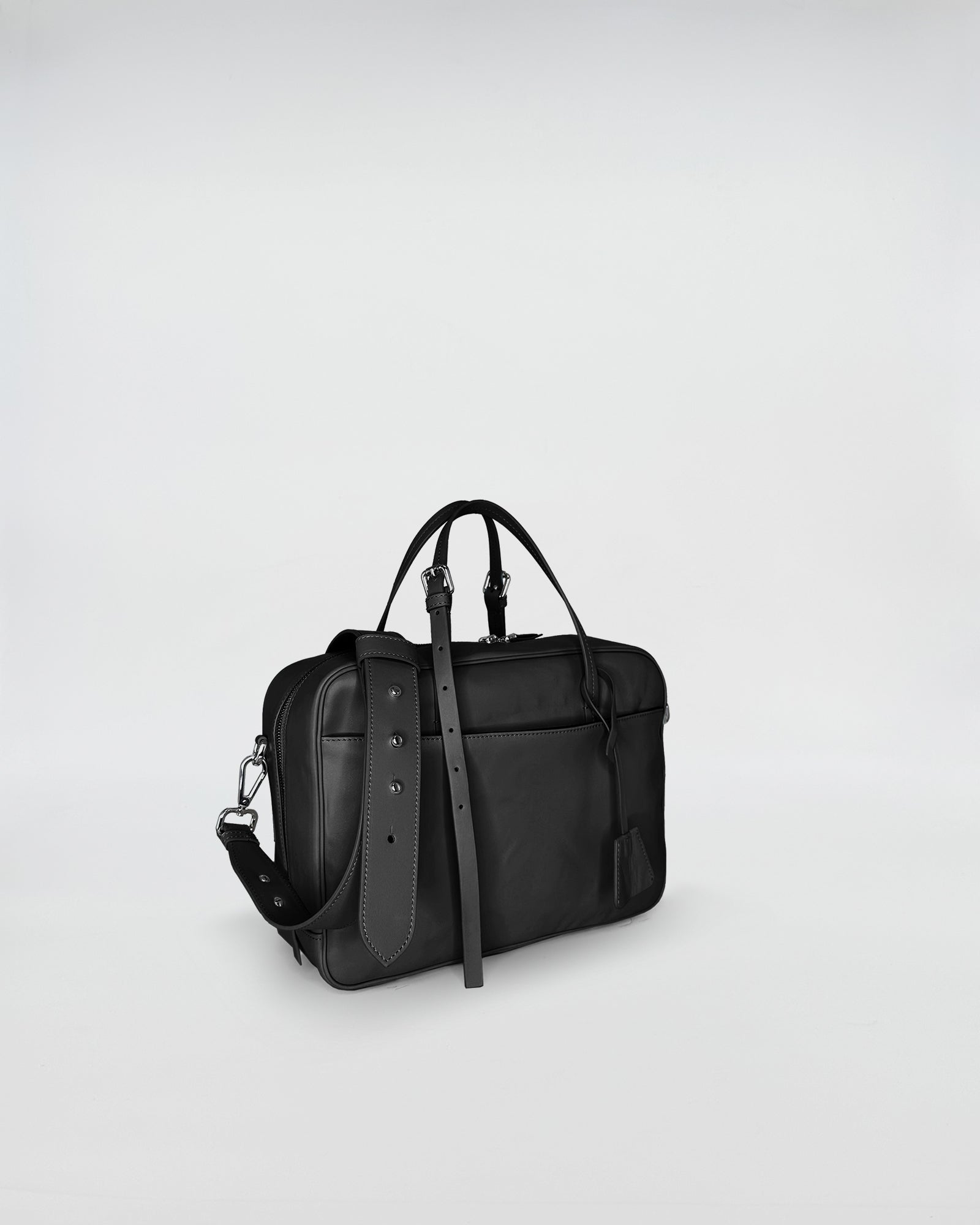 FRIDA SMALL VITELLO LAVATO black leather handbag with adjustable strap and classic design.