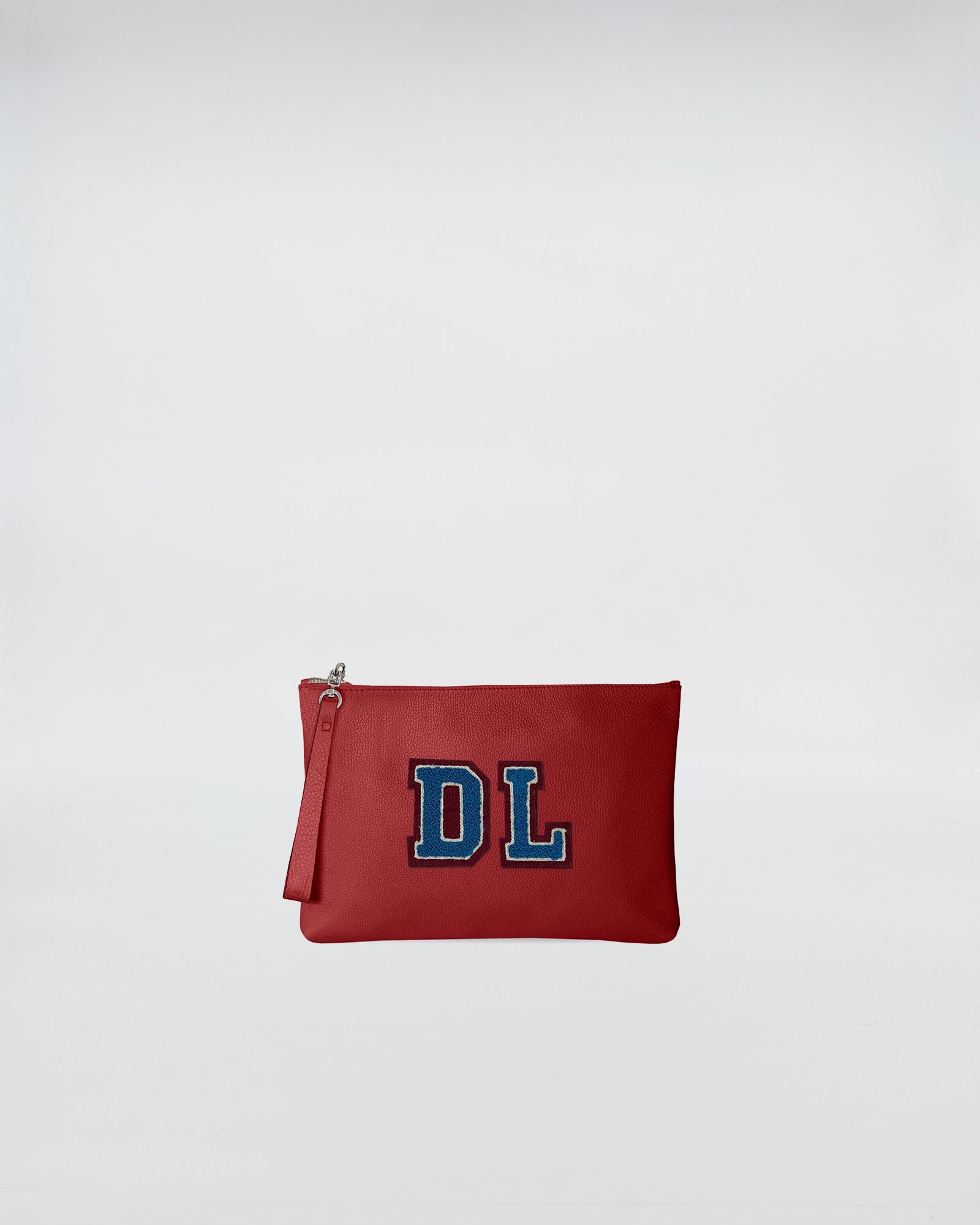 POCHETTE JOY PERSONALIZZATA in red leather with personalized patch DL, functional and stylish accessory.