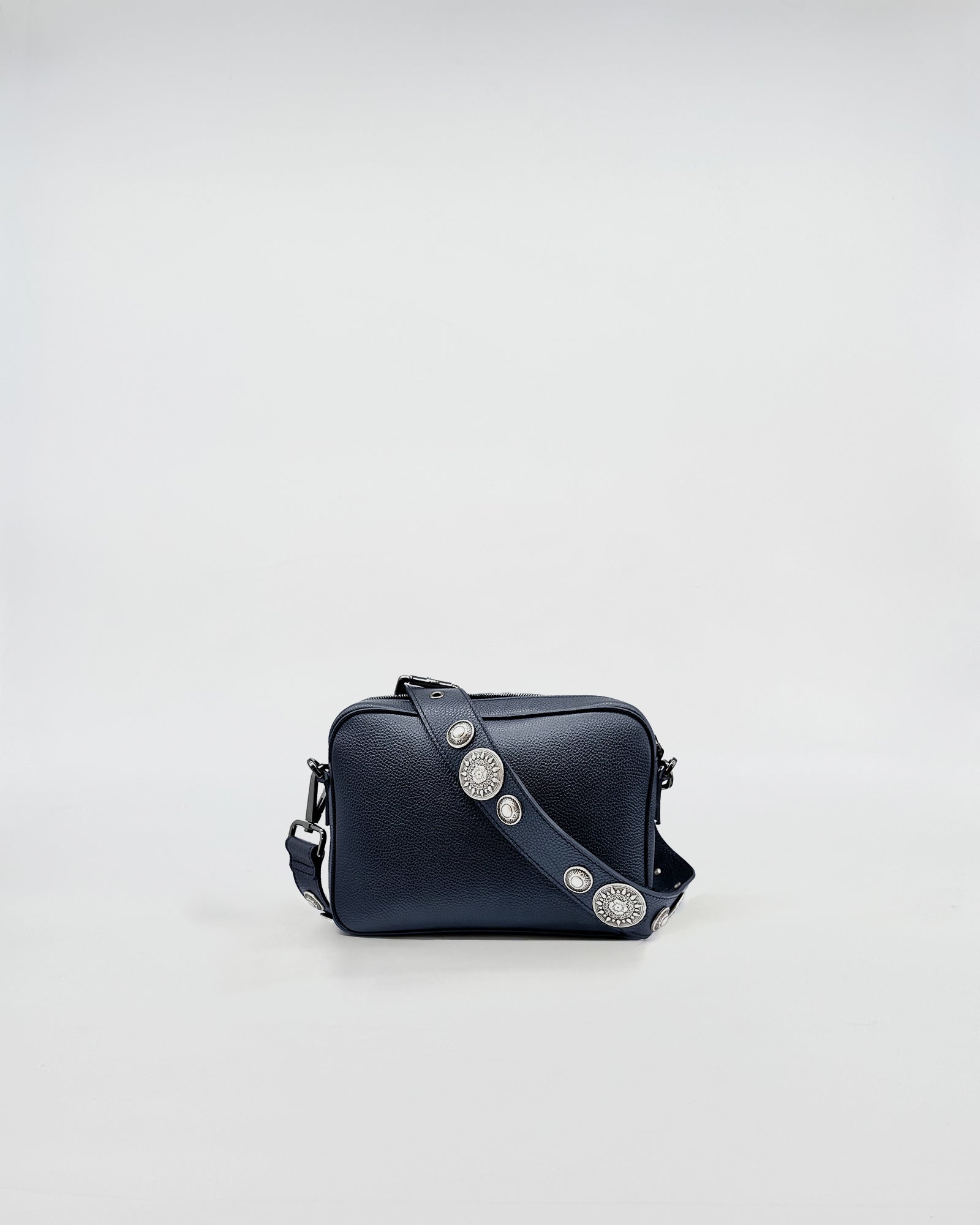 MAFALDA ROCK navy bag with studded strap, showcasing a timeless design and practical style.