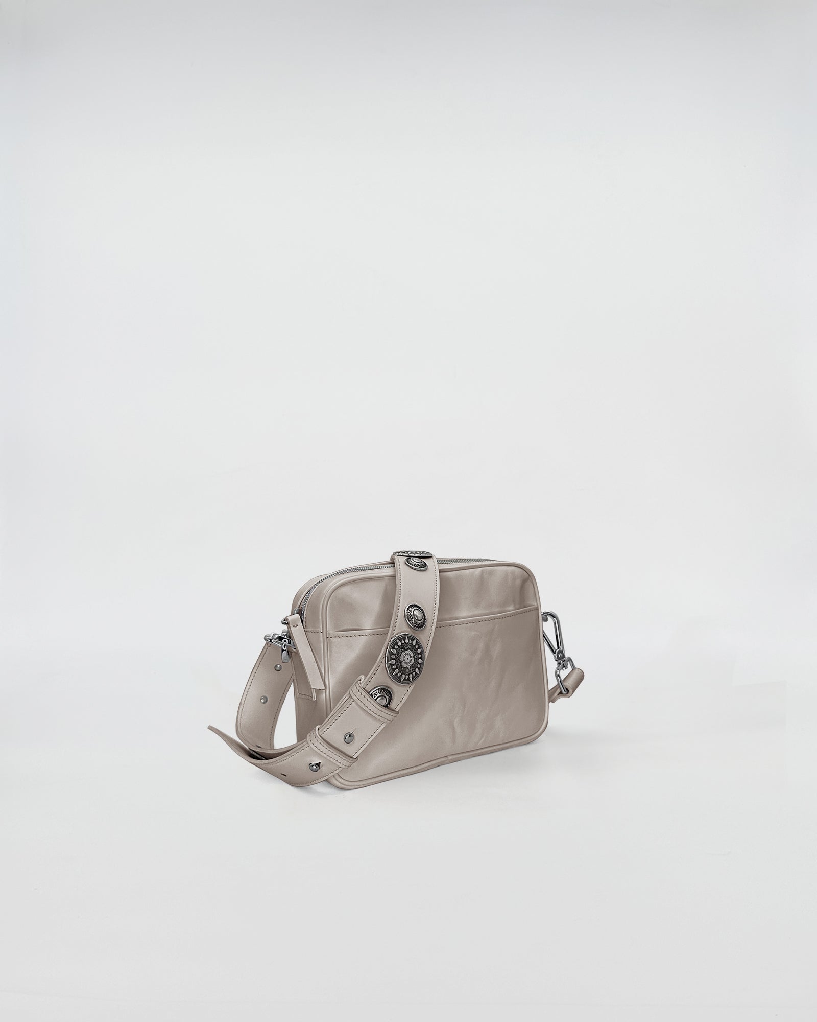 MAFALDA VITELLO LAVATO ROCK handbag with removable adjustable strap and studded detailing.