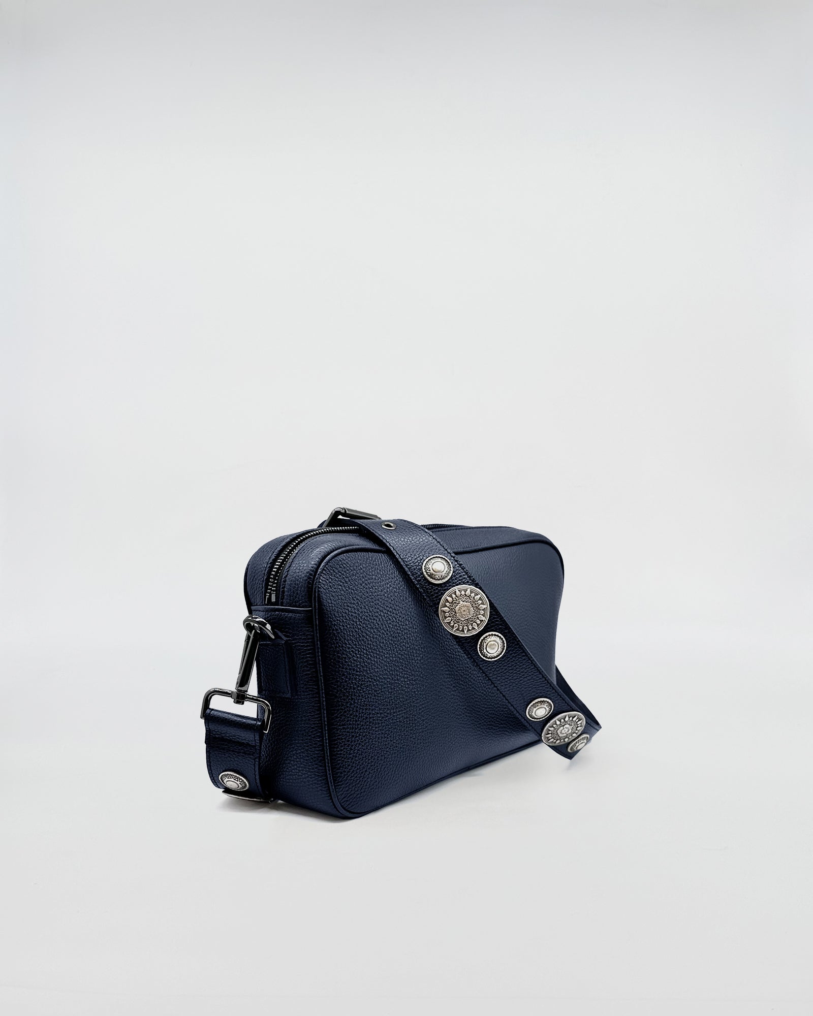 MAFALDONA ROCK navy handbag with removable strap featuring decorative studs.