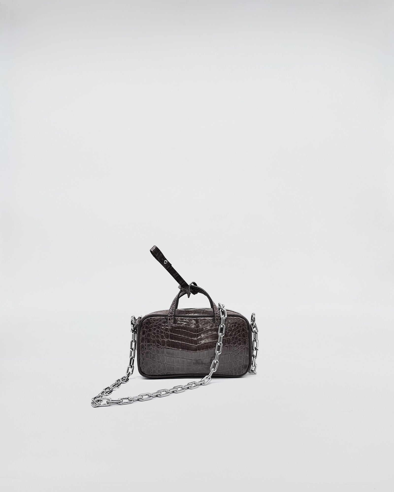 MICRO BAG NINA MEDIUM COCCO RECYCLE with chain strap, elegant and compact design in recycled materials.
