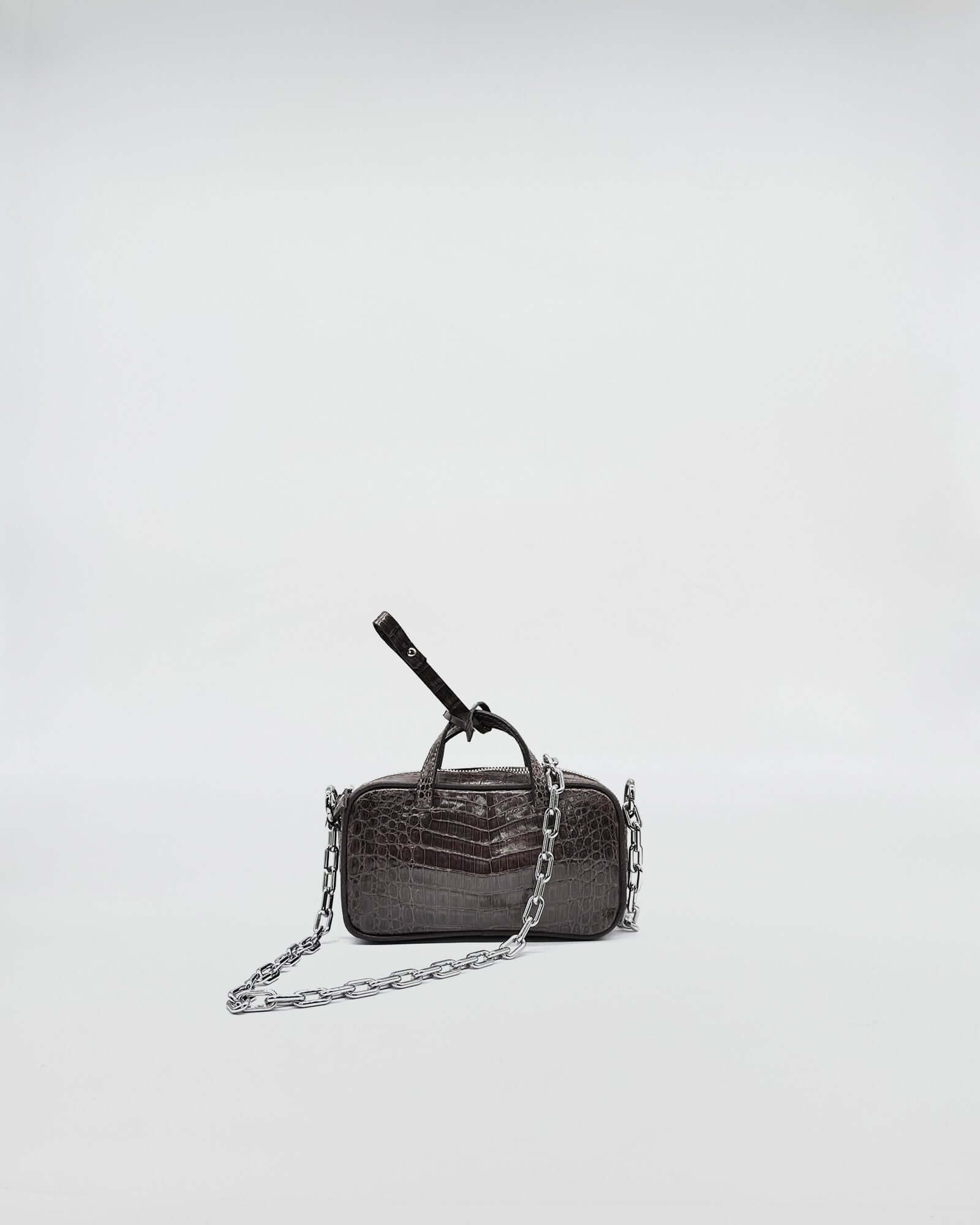 MICRO BAG NINA COLORATA MEDIUM COCCO RECYCLE in dark hue with metal chain strap for evening elegance.