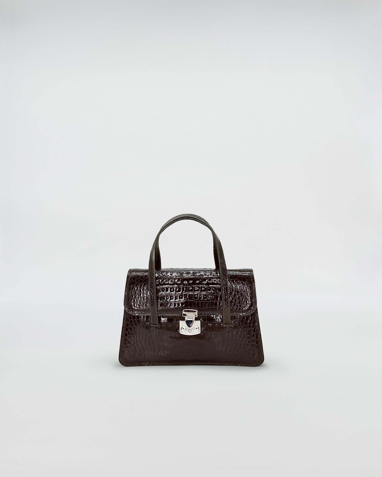 OFELIA COCCO RECYCLE EDITION elegant black handbag with a structured design and slim handles.