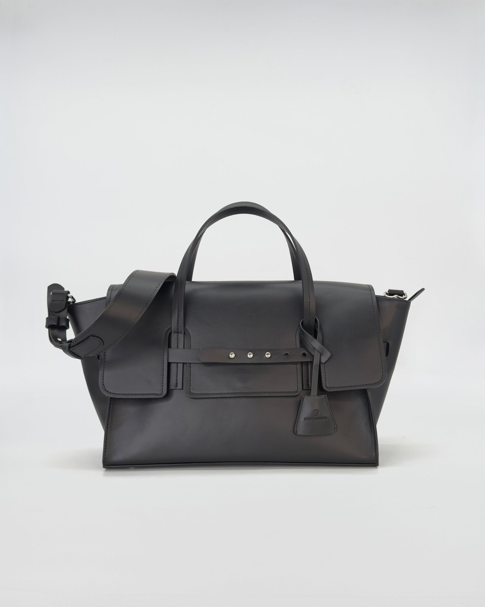 Elegant black medium vitello bag with spacious design and refined strap, perfect for any occasion.