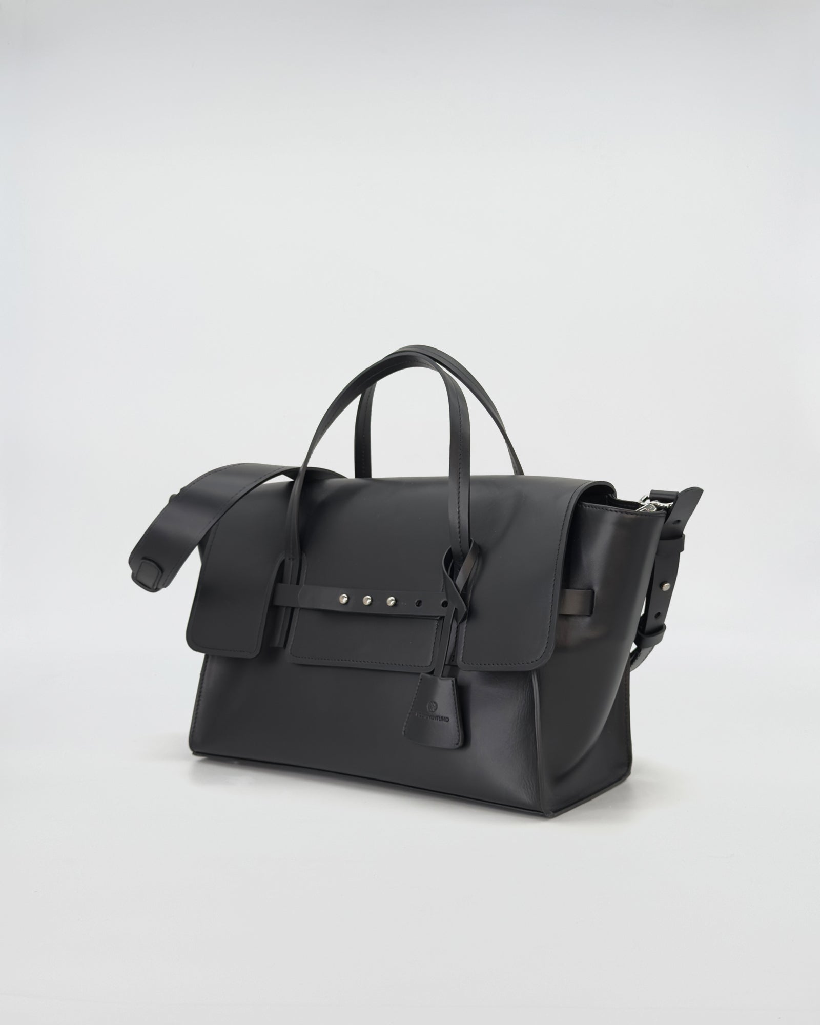 Penny Medium Vitello black handbag with smooth leather, elegant design, and functional strap.