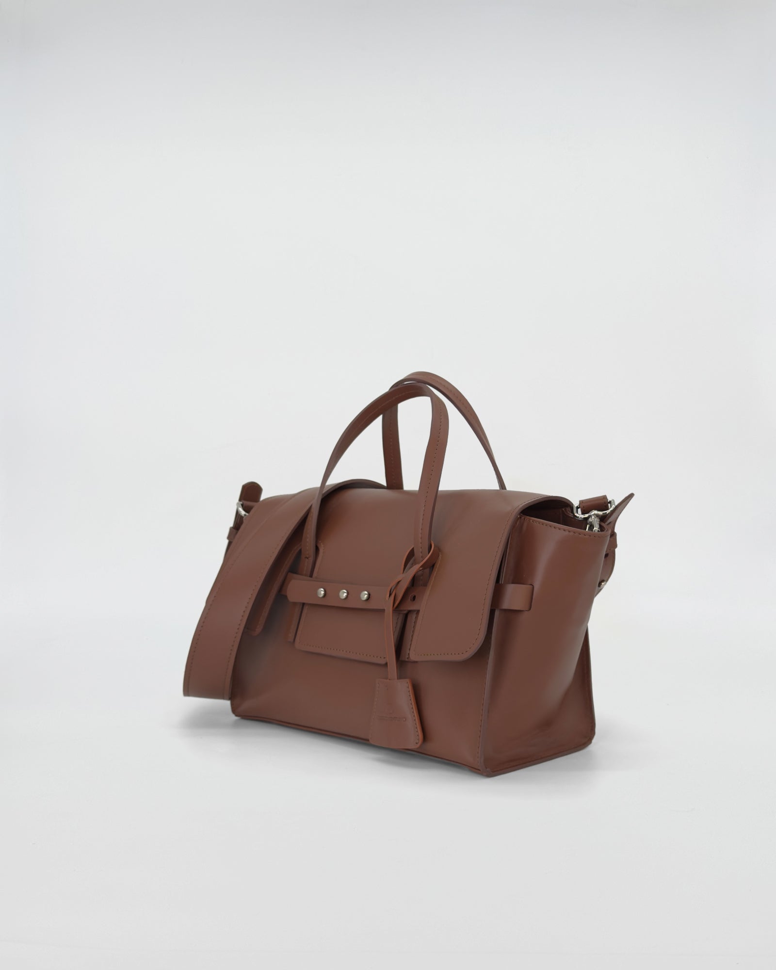Elegant brown Penny Small Vitello bag showcasing sleek design and functional style.