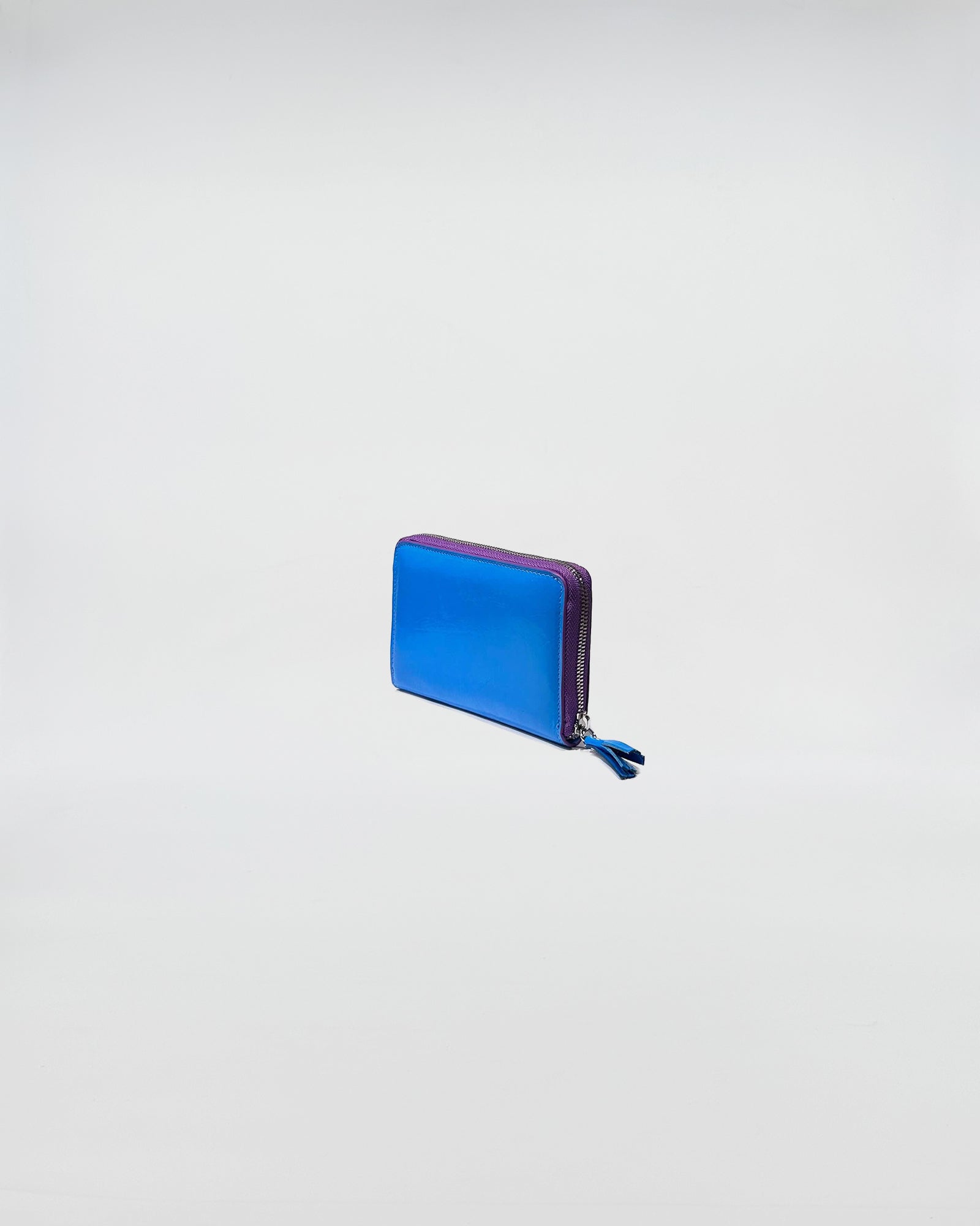 PORTAFOGLIO ZIP SMALL in blue and purple with zip closure, featuring a sleek design for cards and cash.