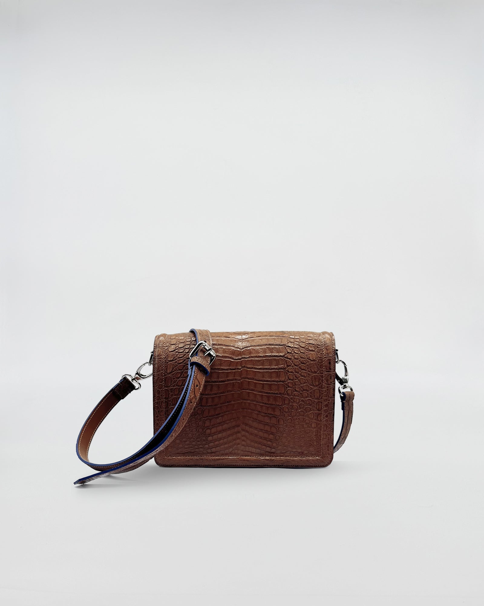 RANIA COCCO RECYCLE elegant brown recycled crocodile handbag with removable strap.