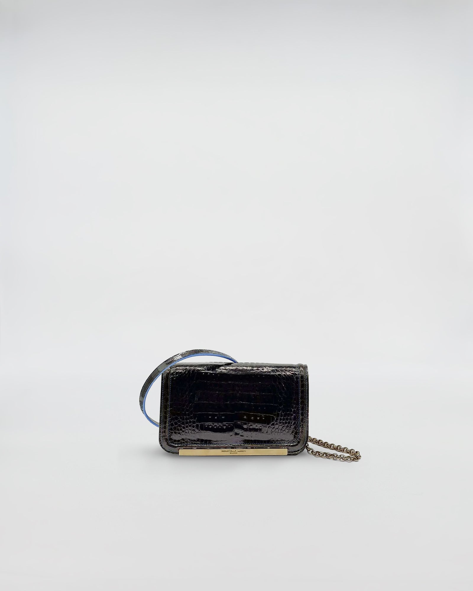 RANIA XMINI COCCO RECYCLE, elegante borsa artigianale in pelle di coccodrillo riciclata, con finiture blu.