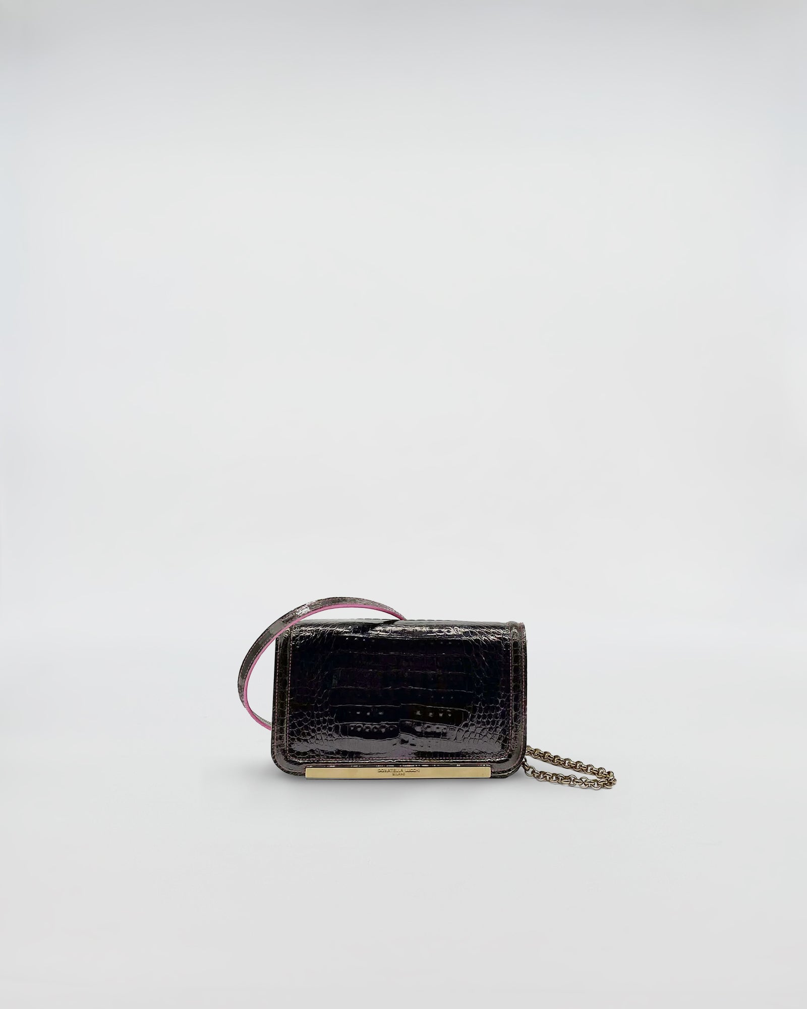 RANIA XMINI COCCO RECYCLE black crocodile leather handbag with chain strap and purple details.