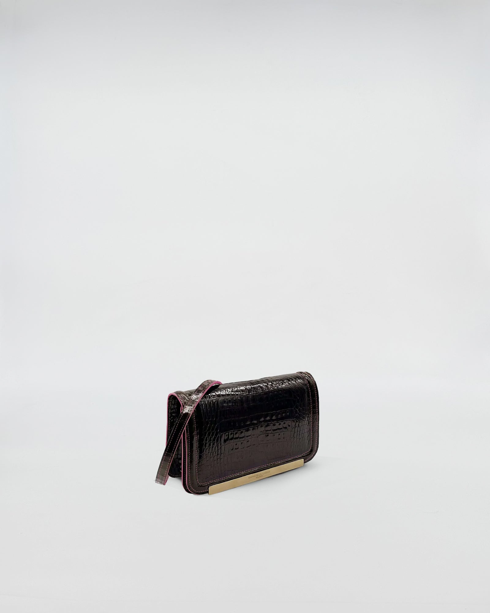 RANIA XMINI COCCO RECYCLE handbag in recycled crocodile leather, showcasing elegant design with green stitching.