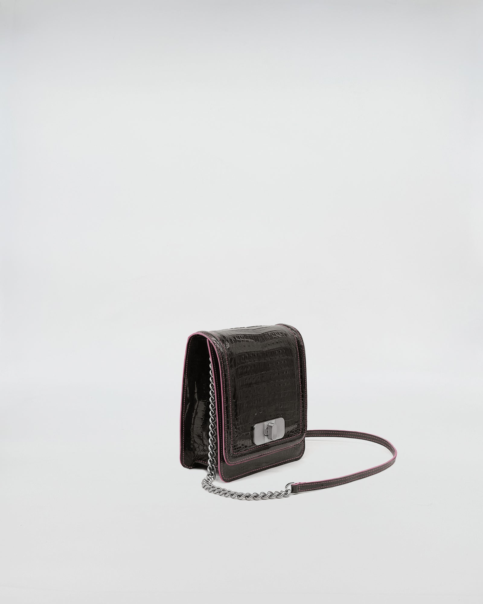 SISSI - COCCO RECYCLE elegant crocodile leather bag with emerald suede lining and chain strap.